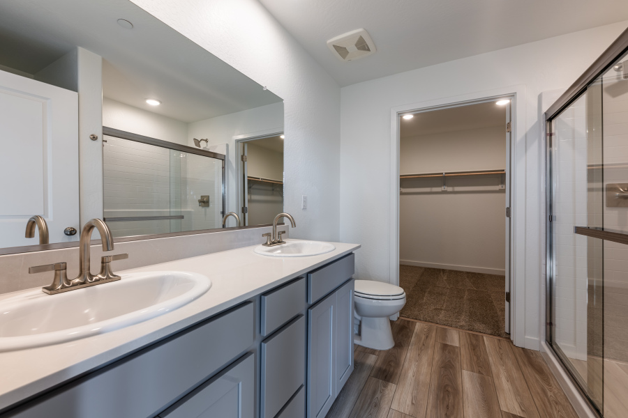 A bathroom with a glass shower.