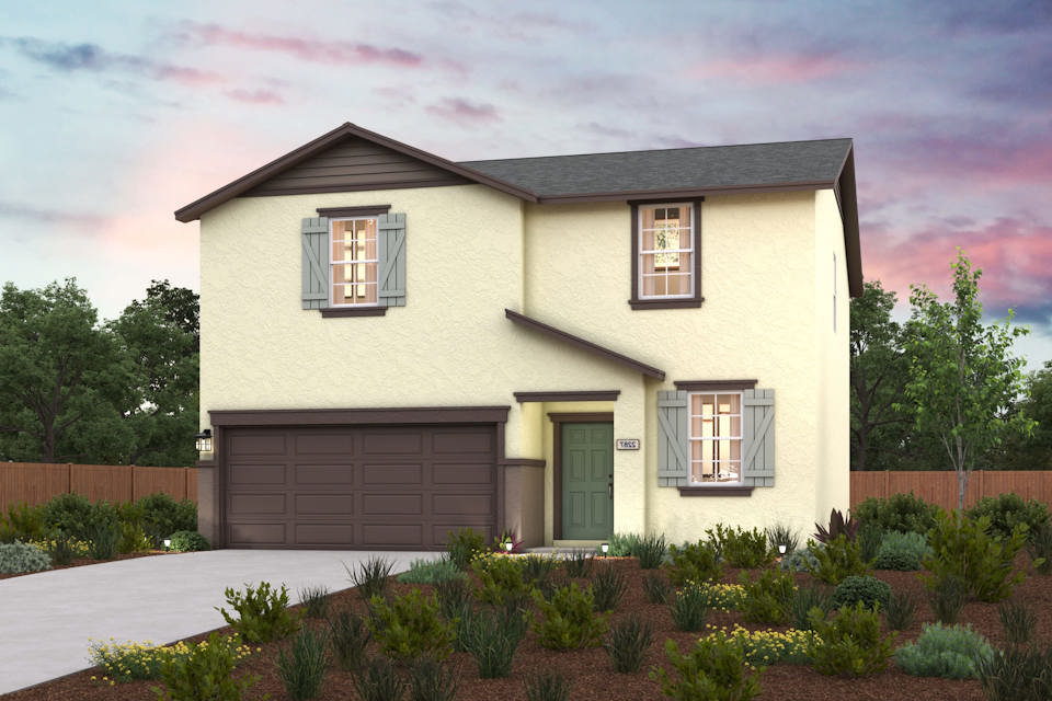 A house with a garage and a fence around it.