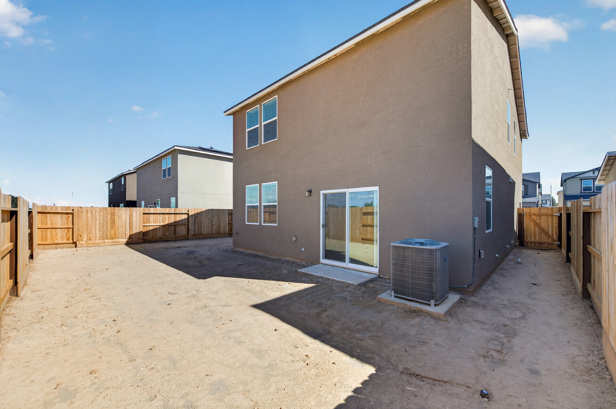 A house with a fence around it.