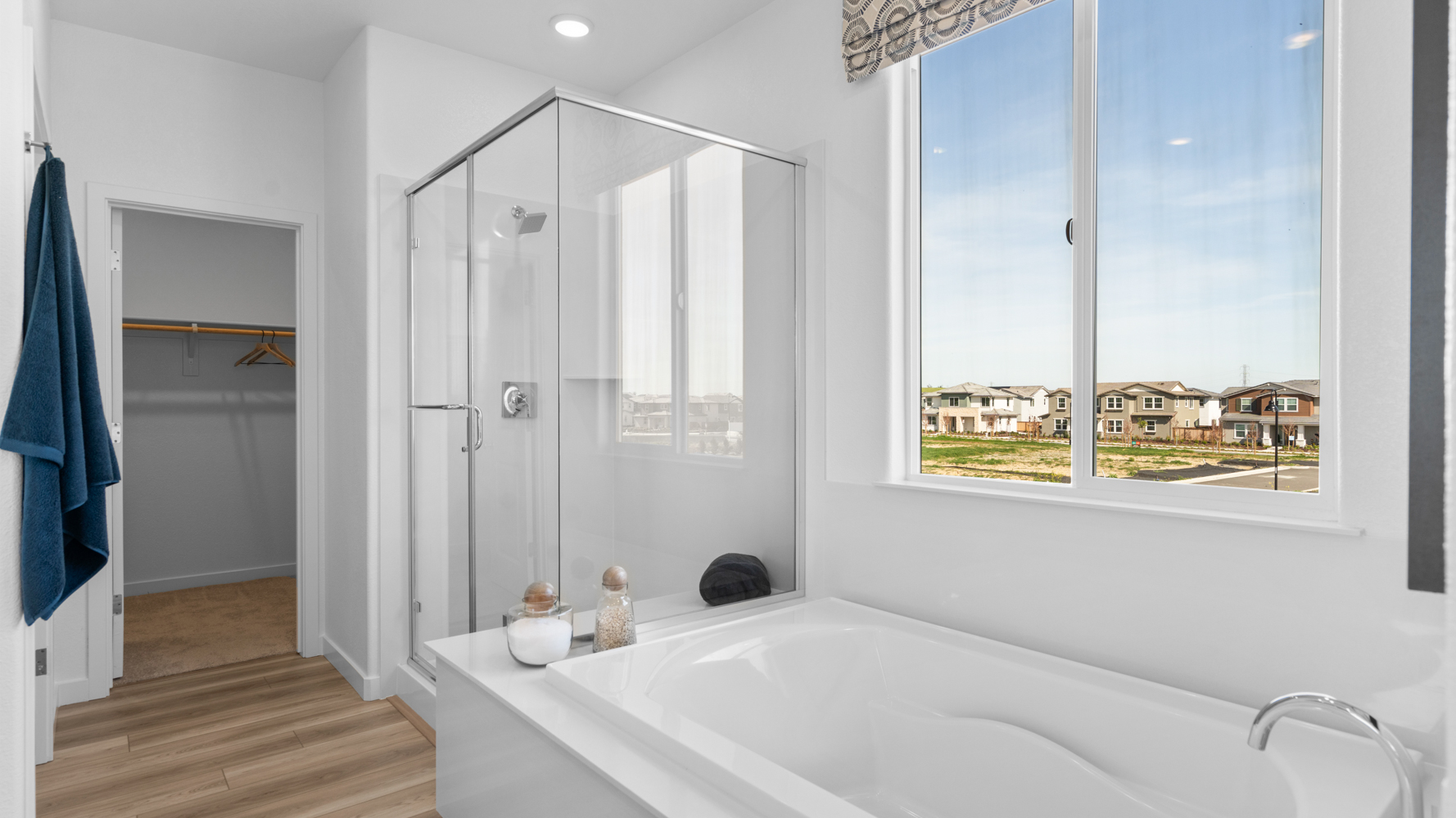 A bathroom with a large glass shower.