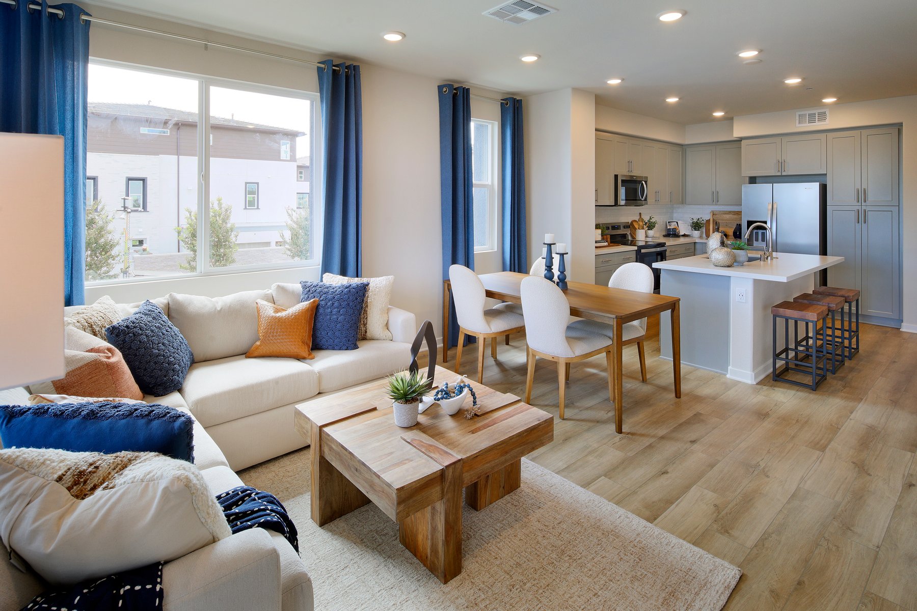 A living room with a large window.