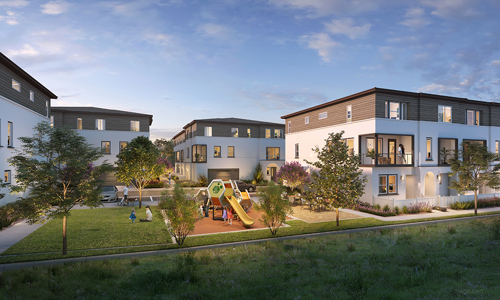 A group of buildings with trees and grass in front of them.