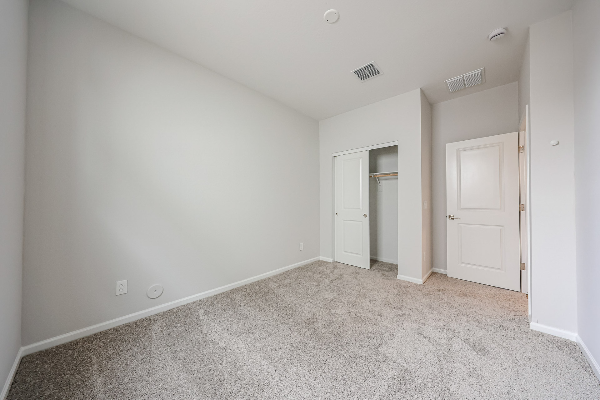 A room with white doors.