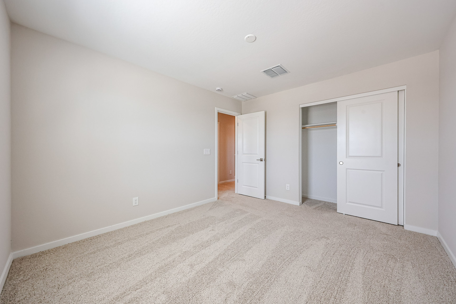 A room with white doors.