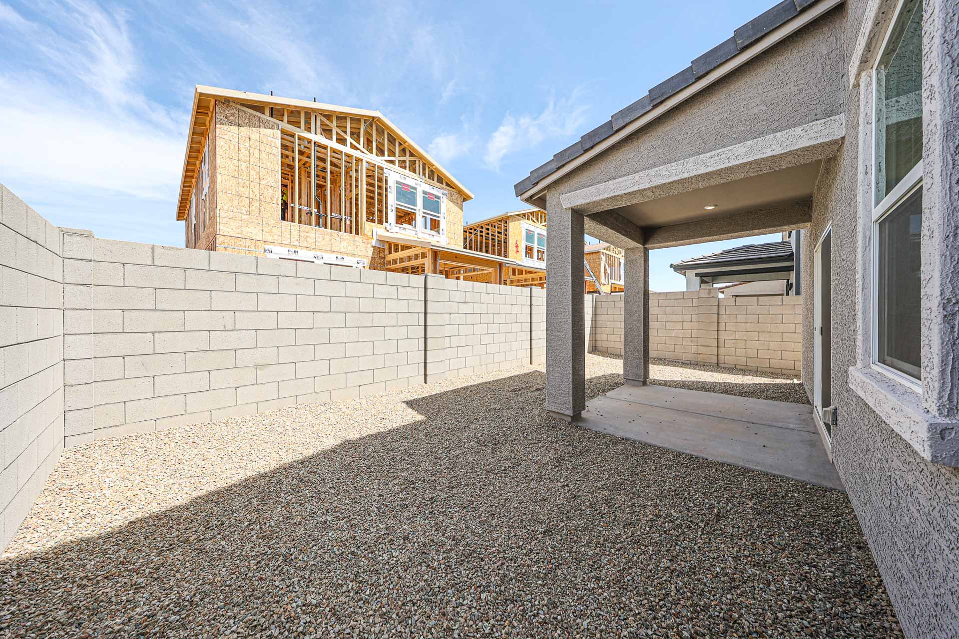 A stone path between two buildings.