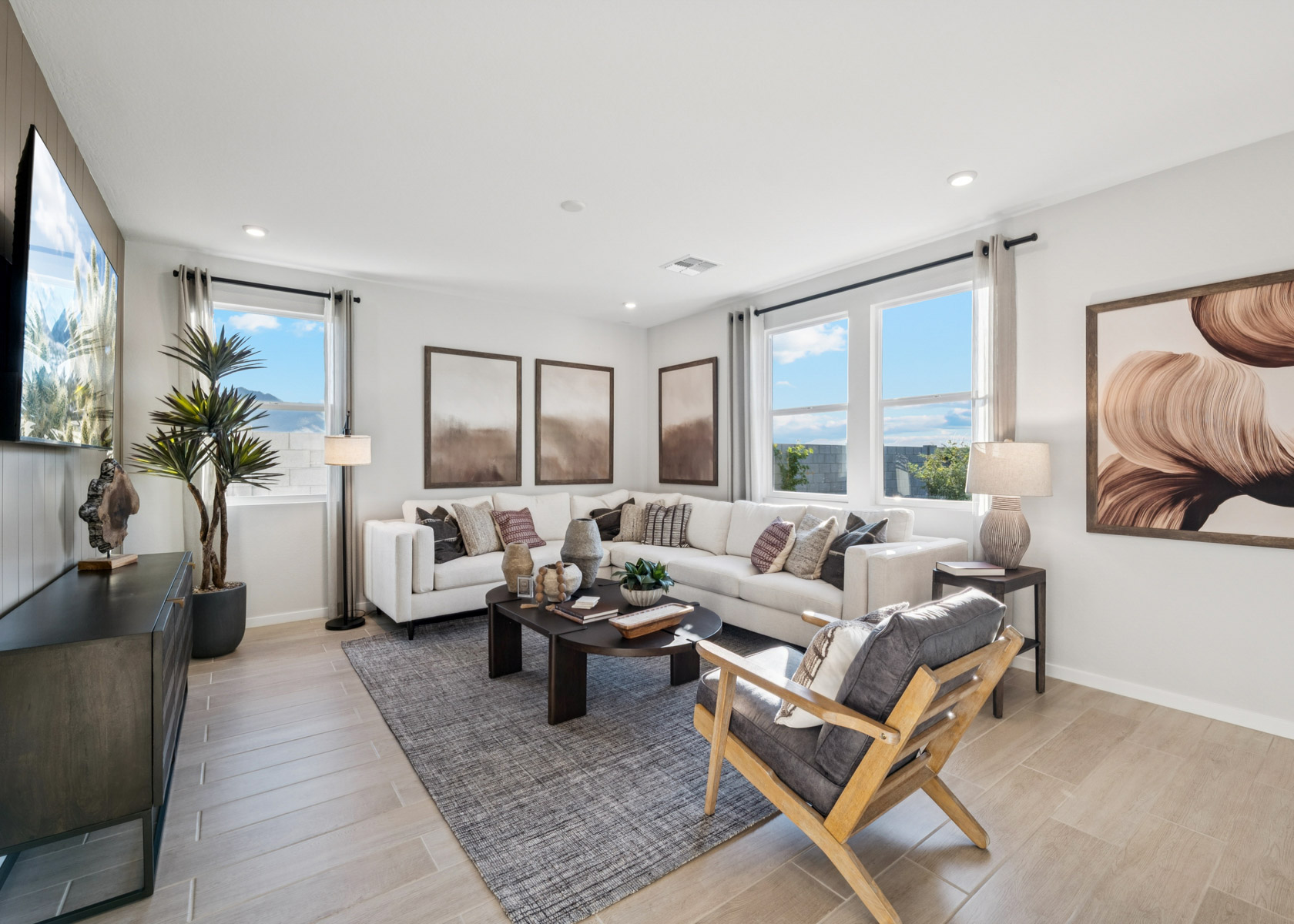 A living room with a large window.