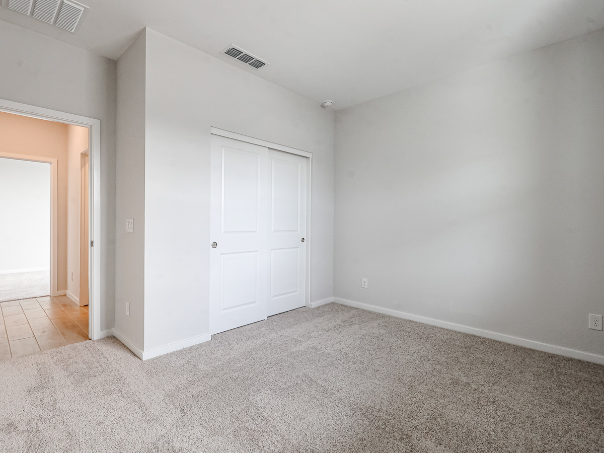 A room with white doors.
