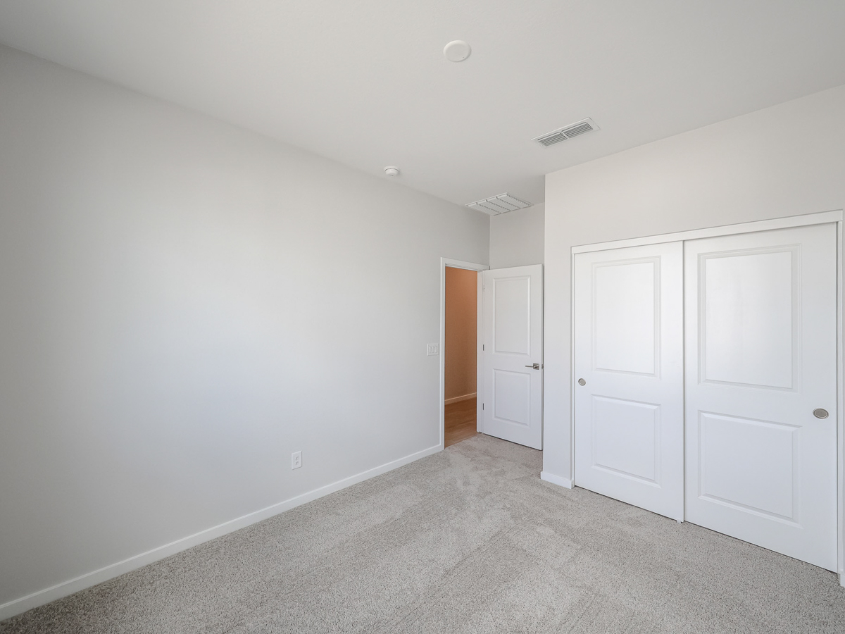 A room with white doors.