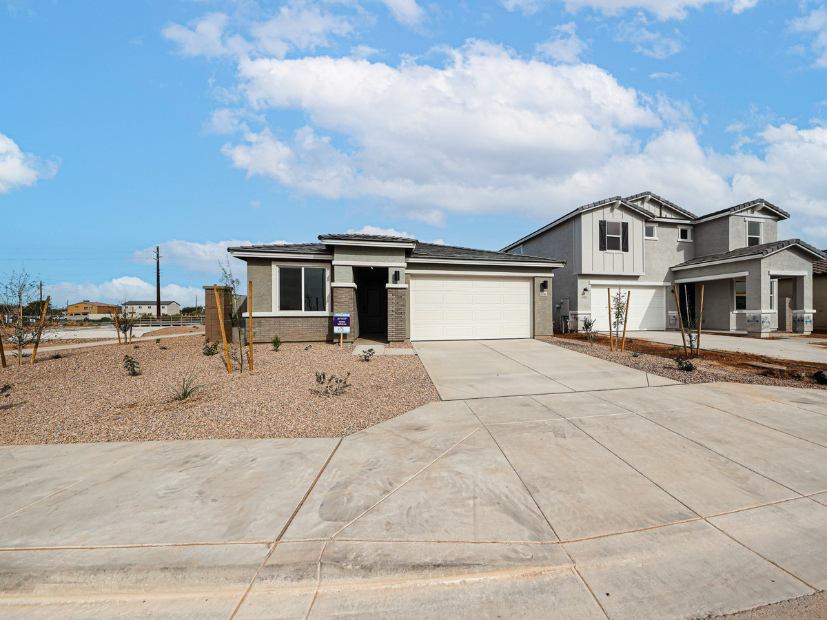 A building with a lot of dirt in front of it.
