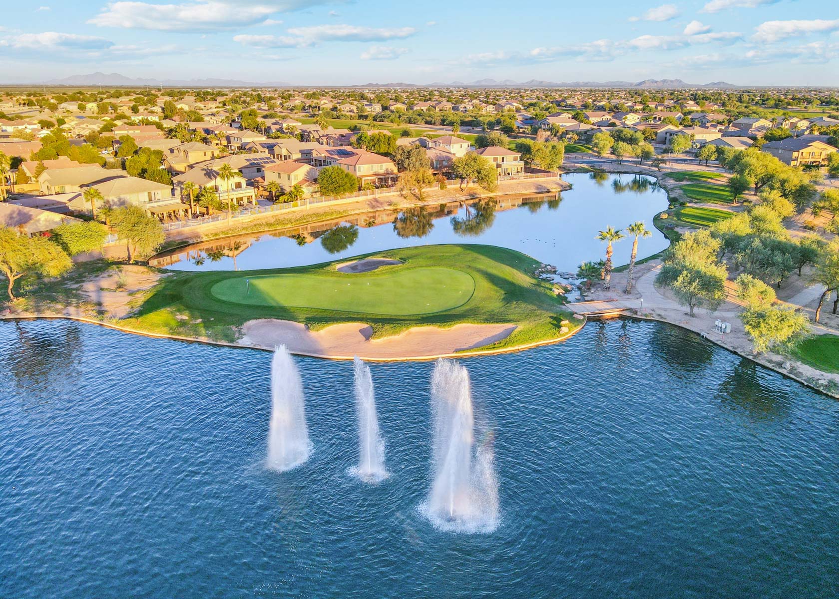 A beautiful landscape with a fountain.