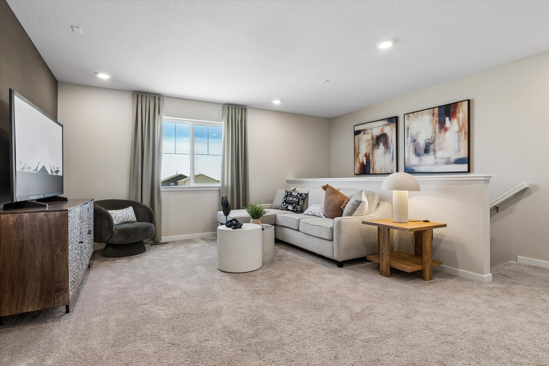 A living room with a large window.