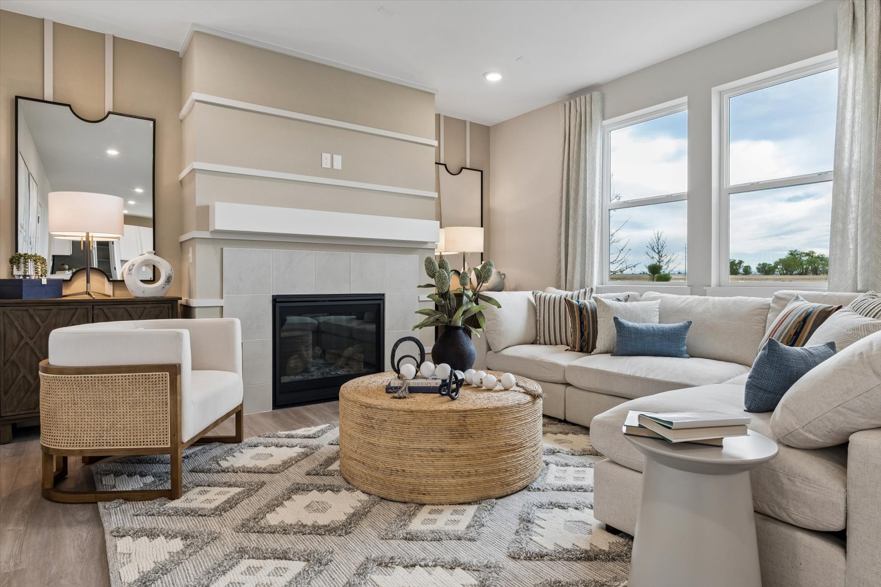 A living room with a fireplace.