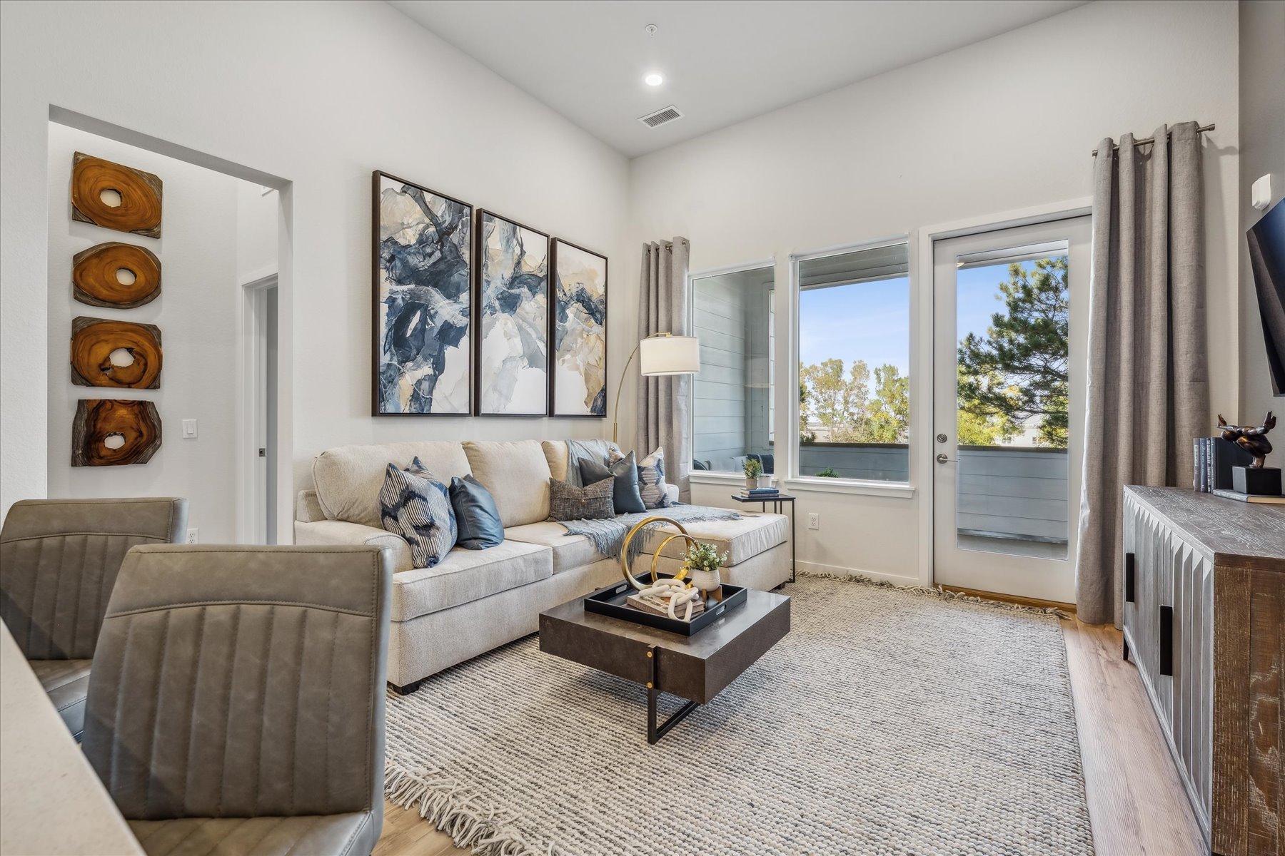 A living room with a couch and a coffee table.
