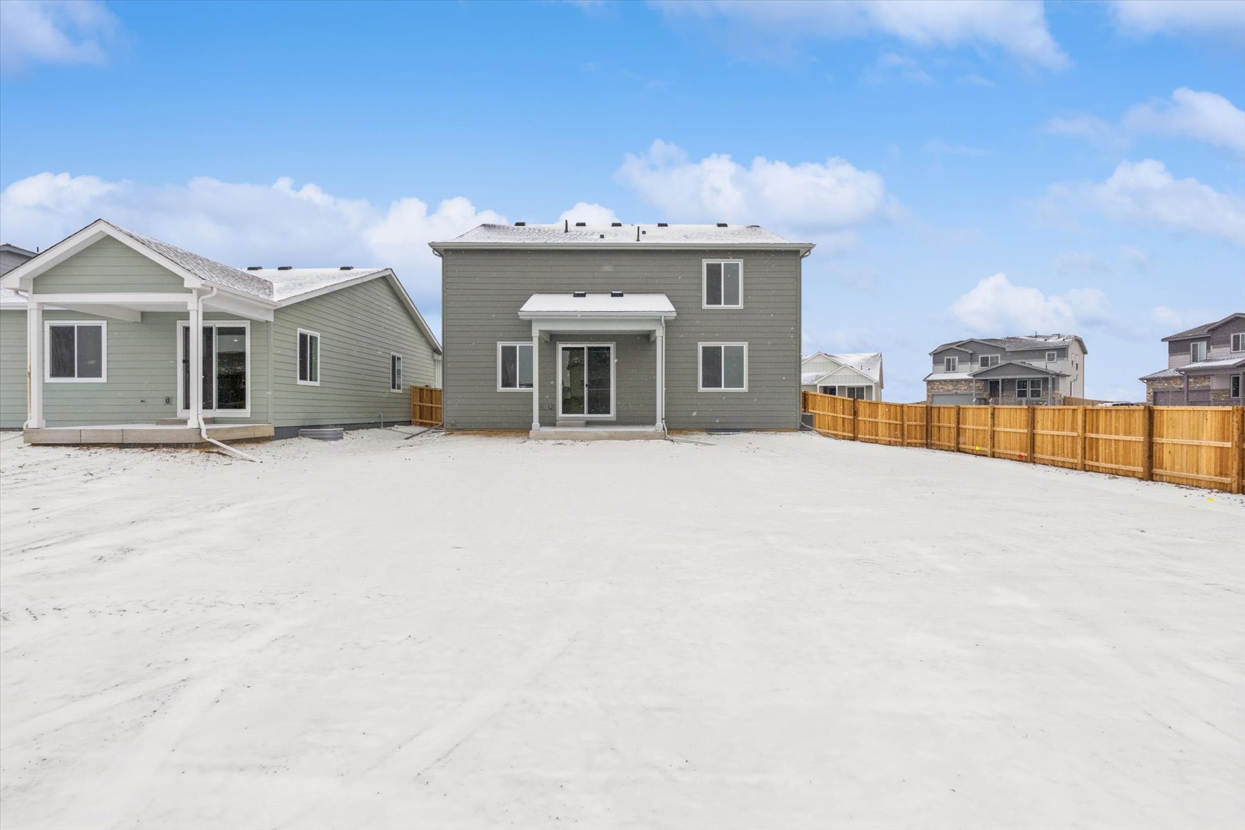 A group of houses in a snowy area.