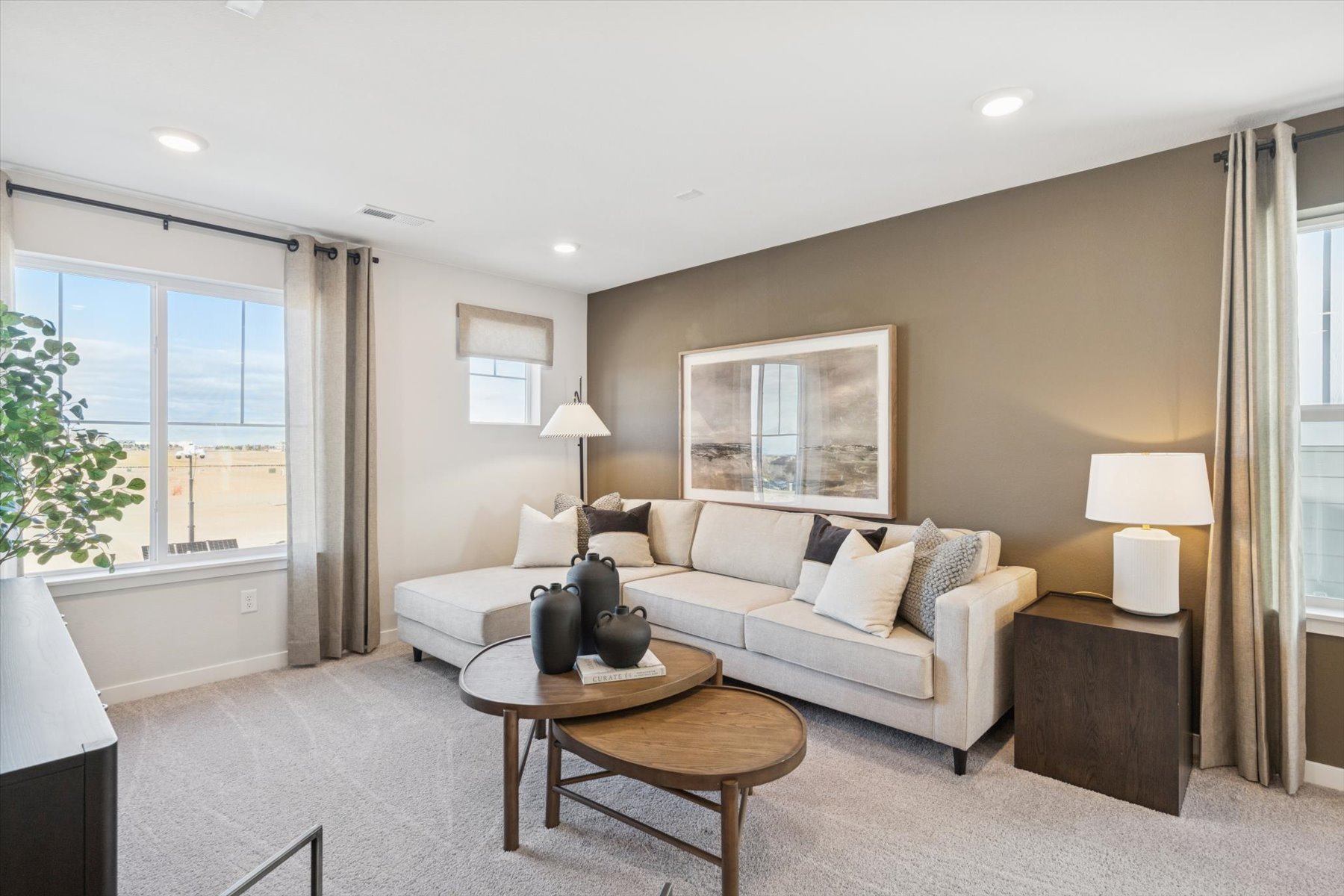 A living room with a couch and a coffee table.