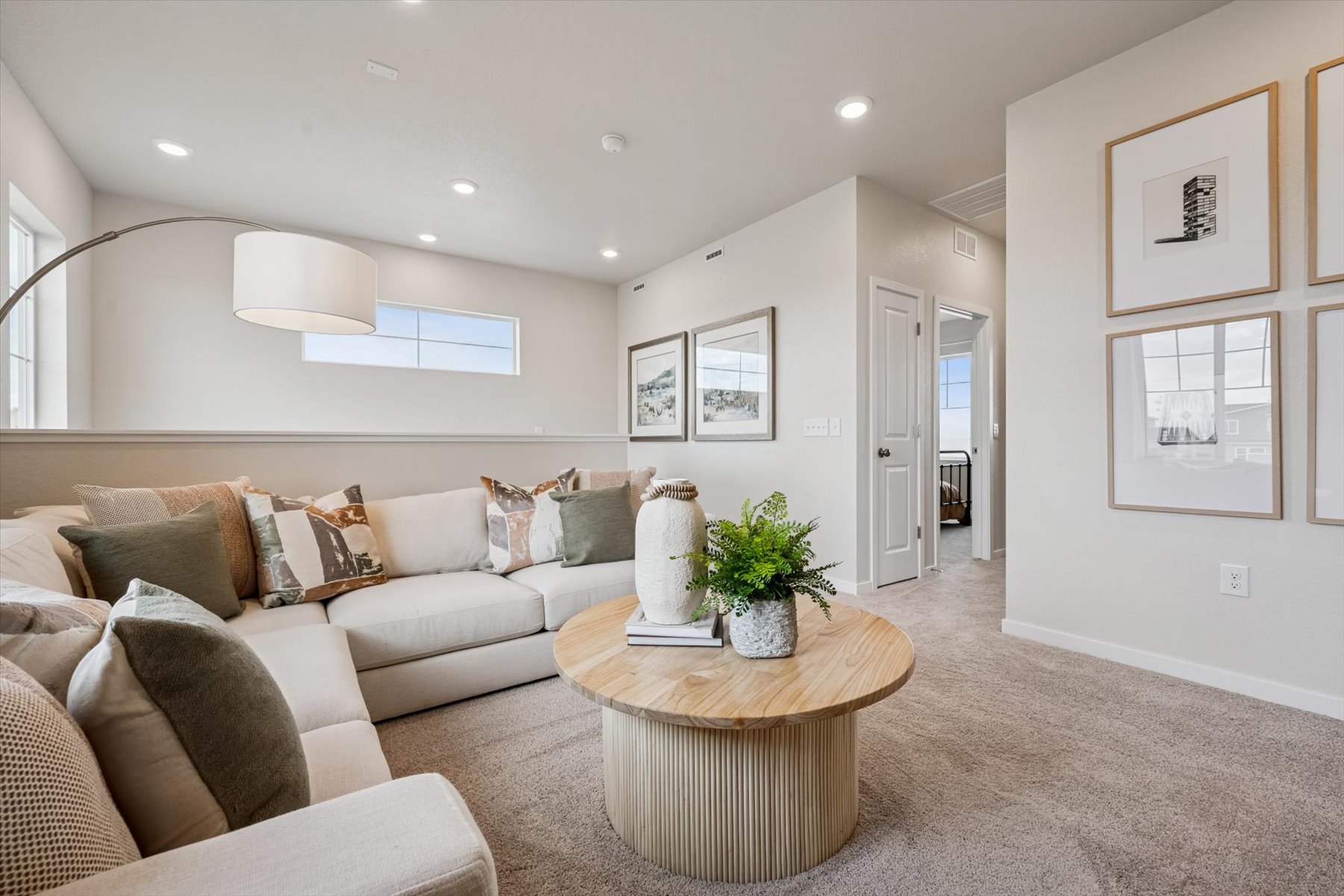 A living room with a couch and a coffee table.