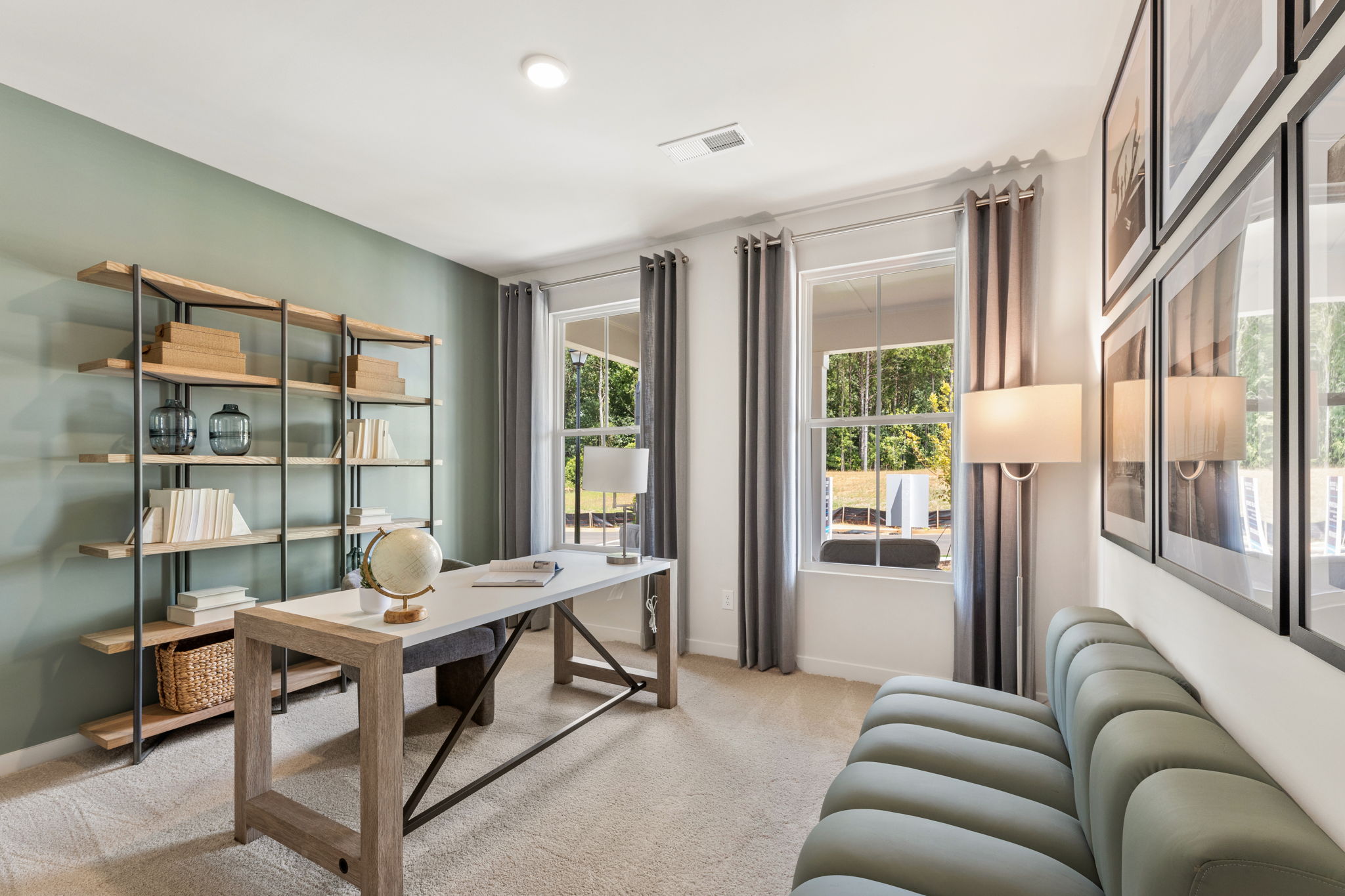 A room with a table and chairs.