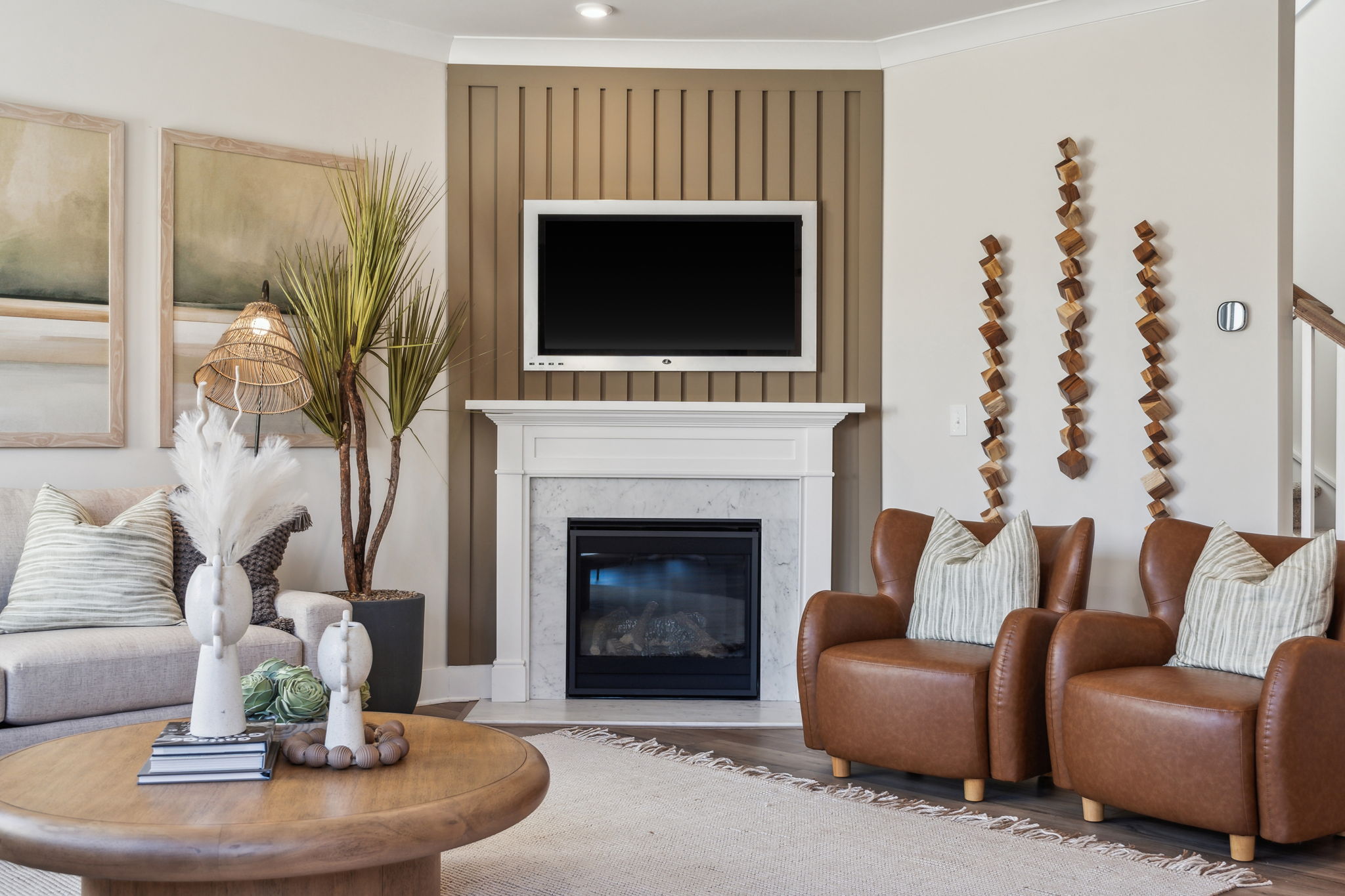 A living room with a fireplace.