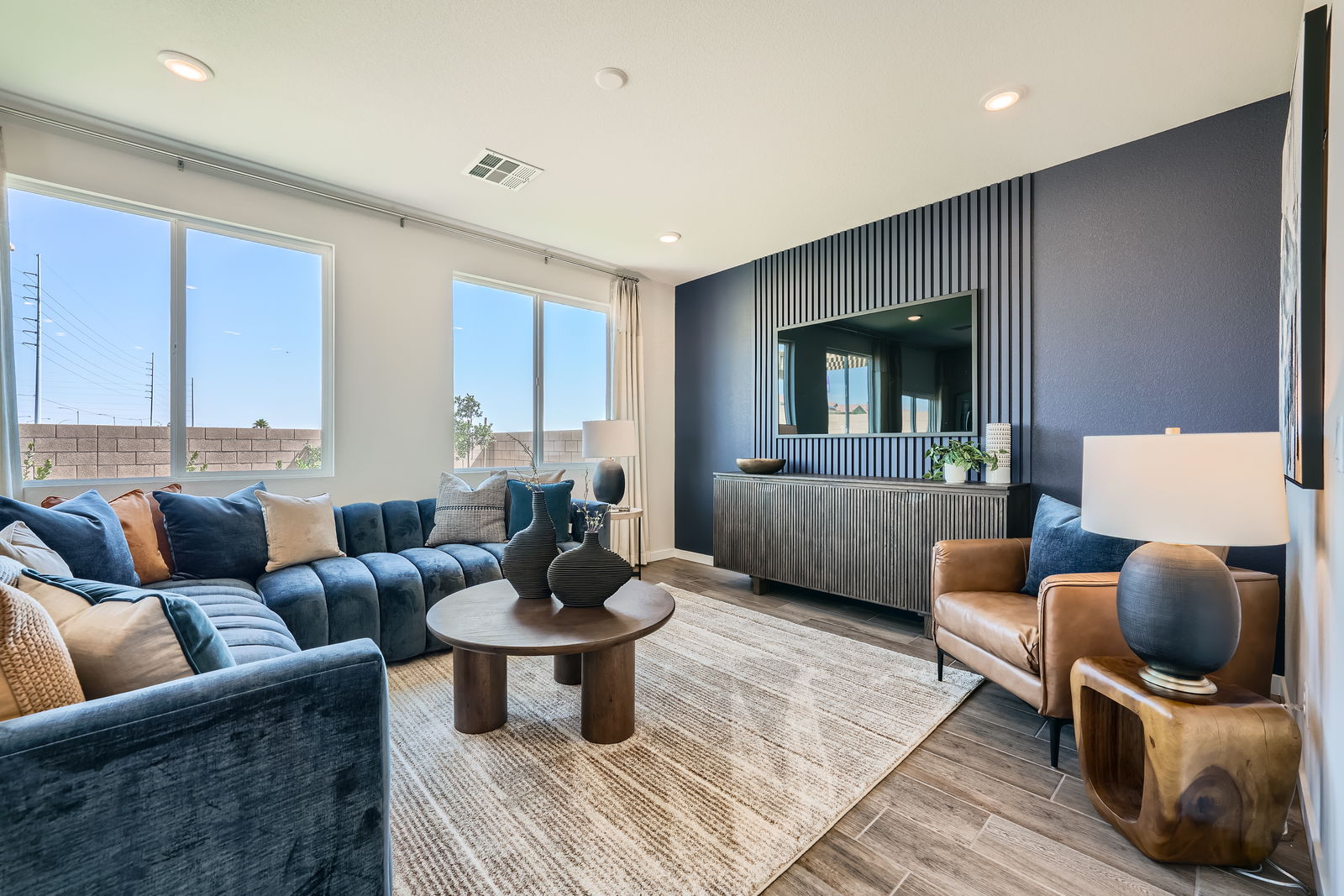 A living room with a large window.