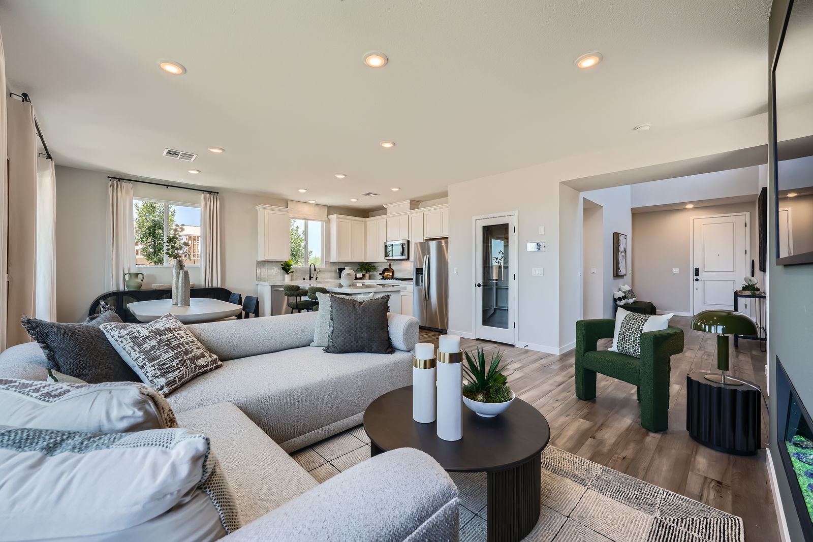 A living room with a couch and a table.
