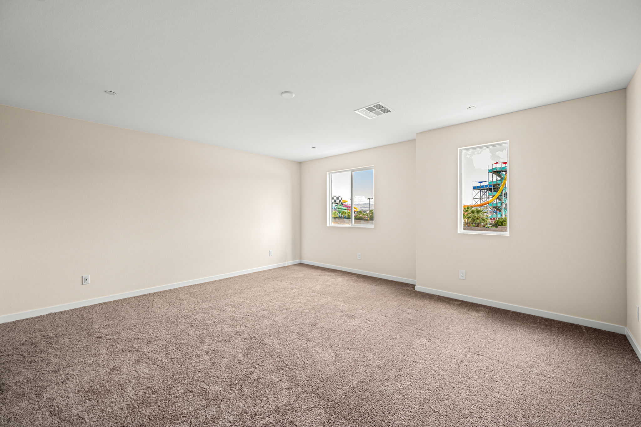 A room with a carpet and a rug.