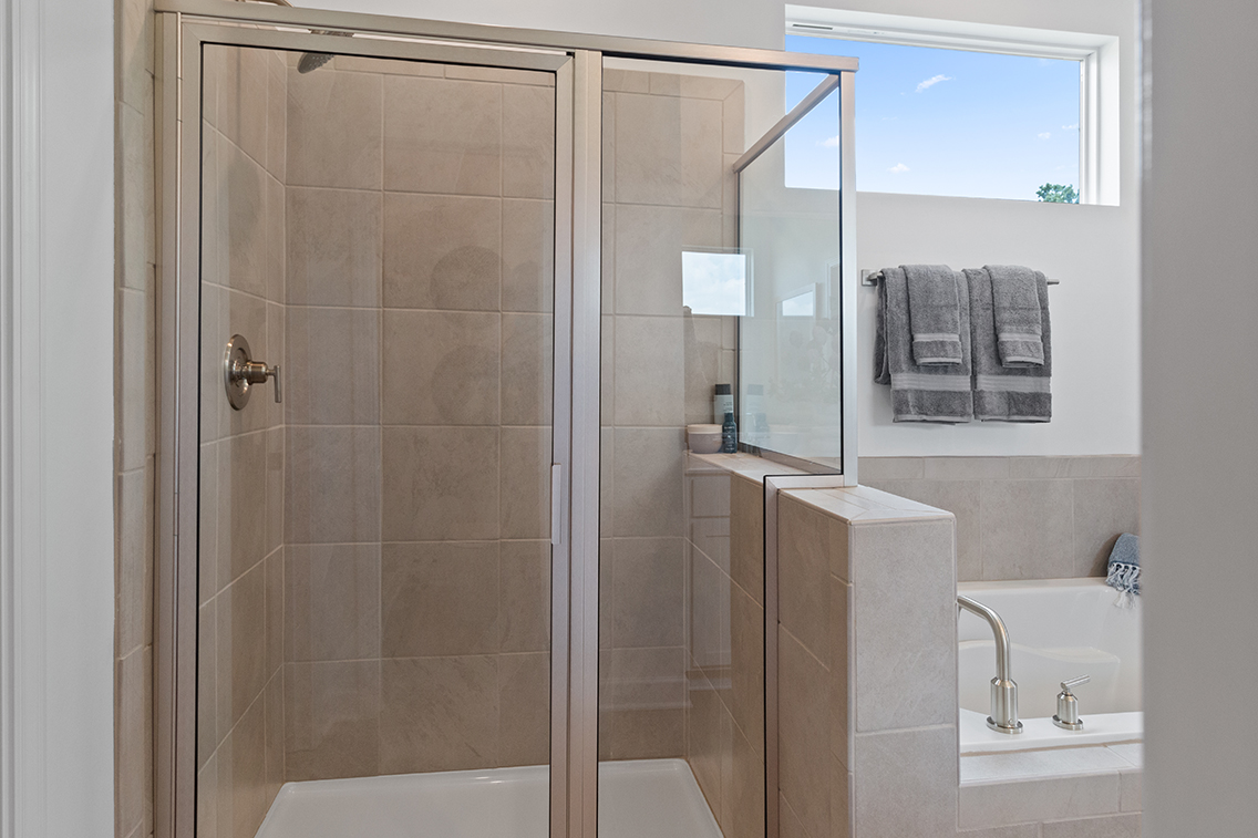 A bathroom with a glass shower.