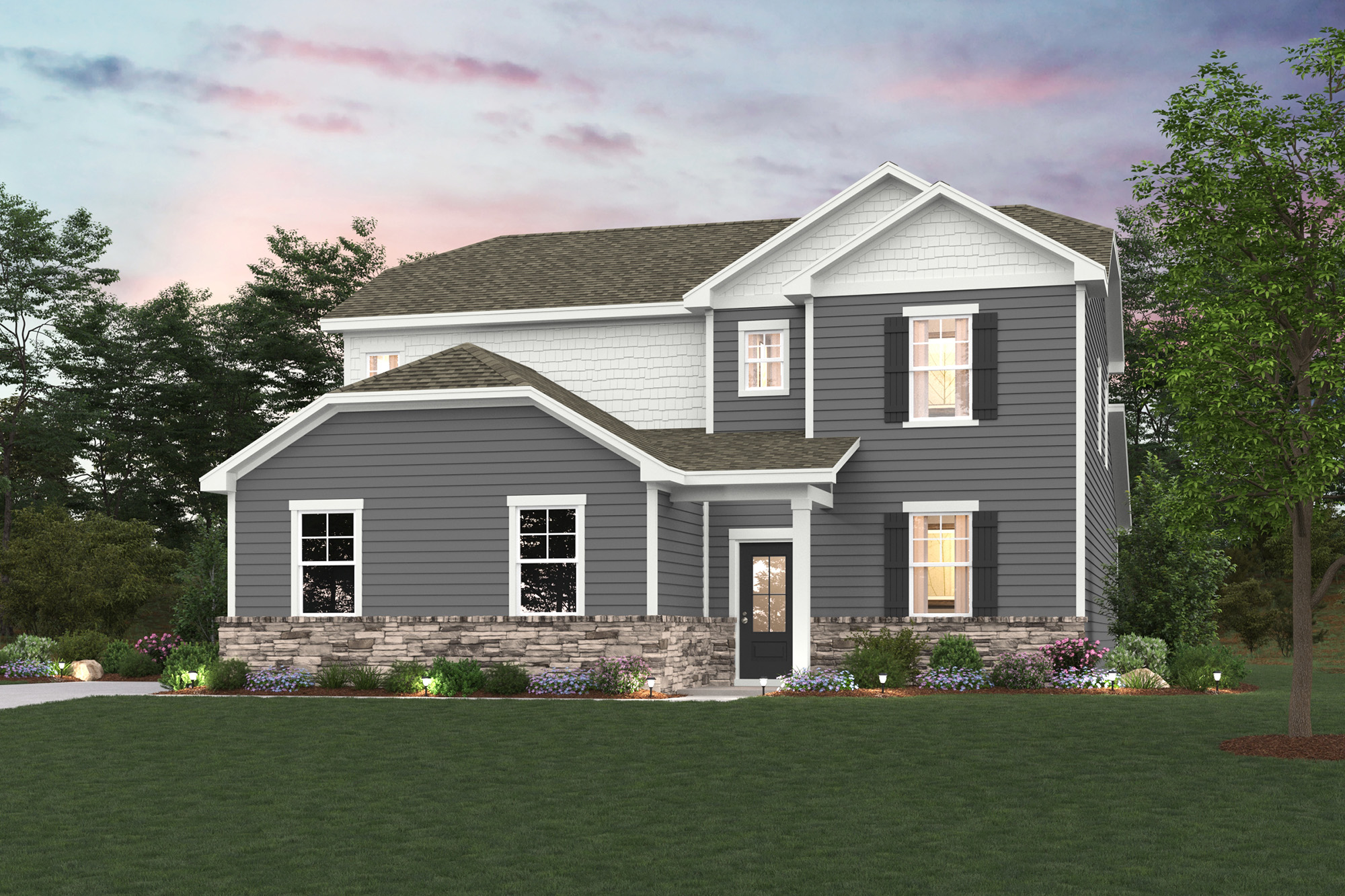 A house with a lawn in front of it.