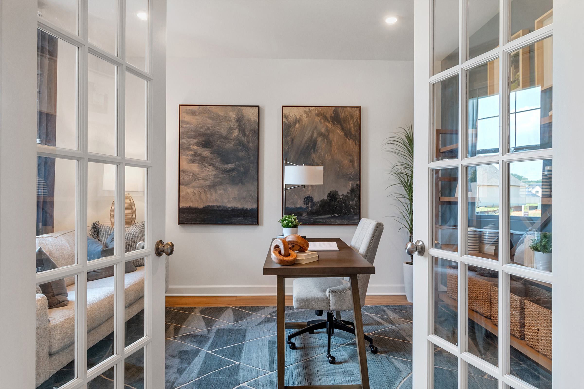 A room with a table and chairs.