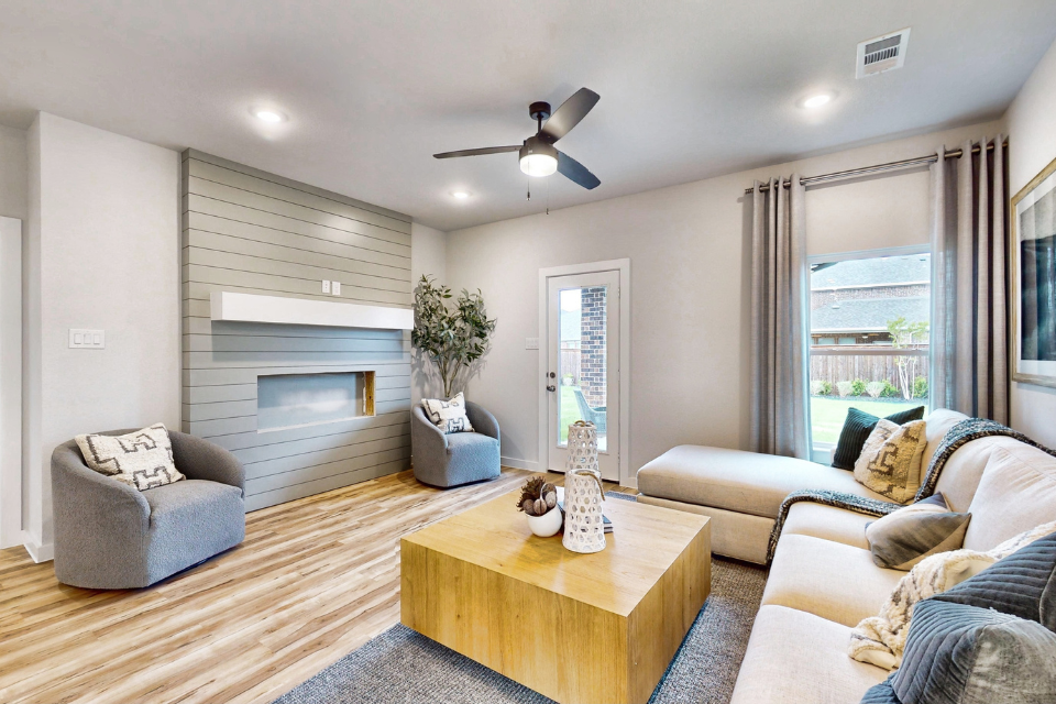 A living room with a fireplace.