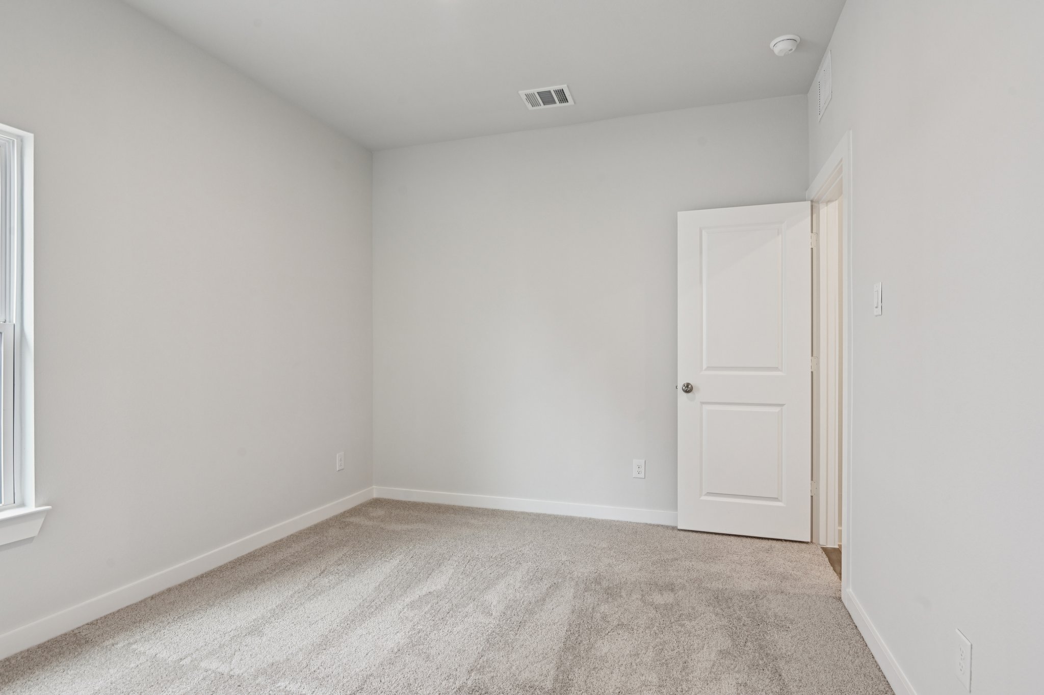 A room with white walls.