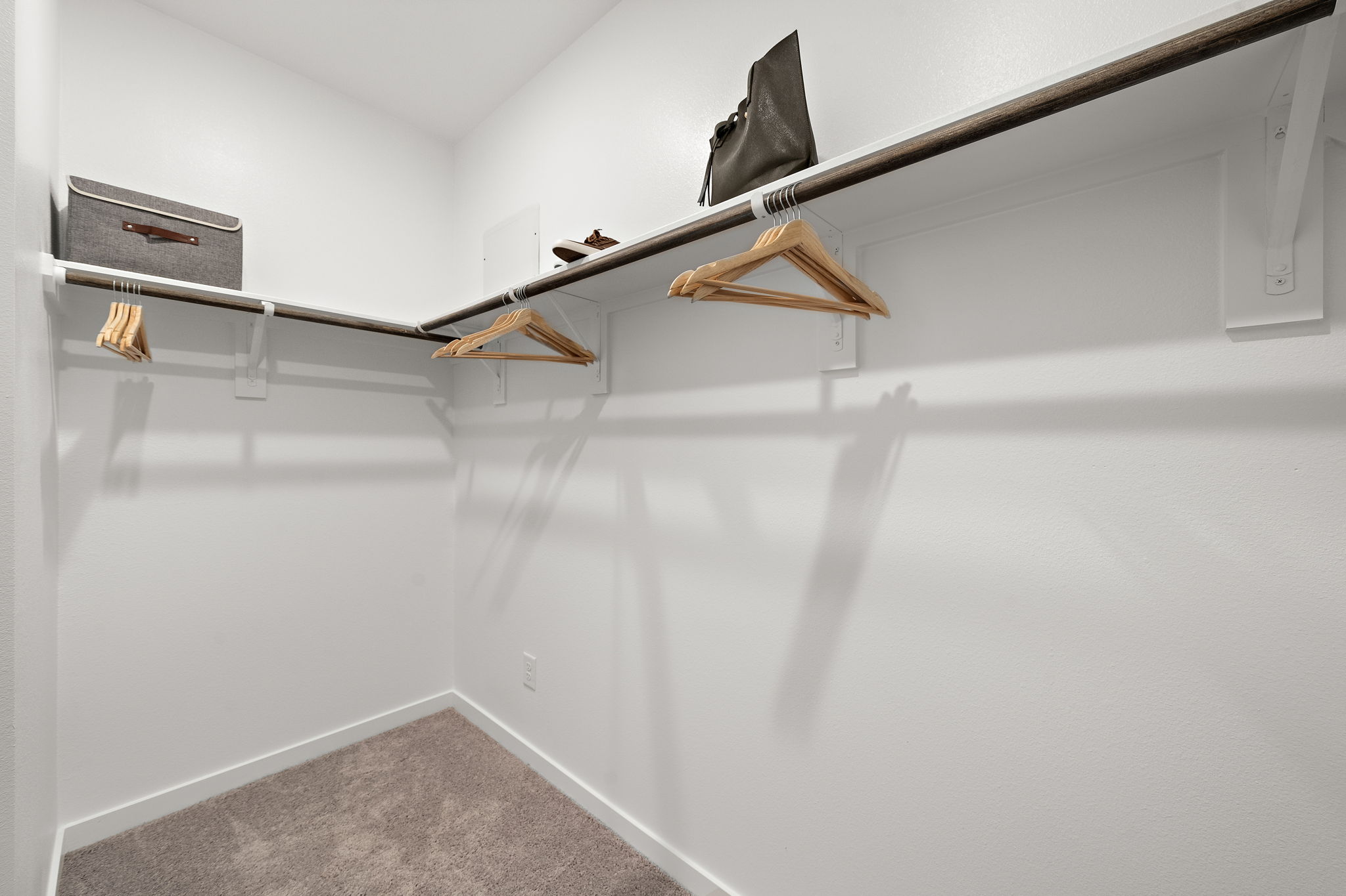 A staircase with a black cloth from the ceiling.