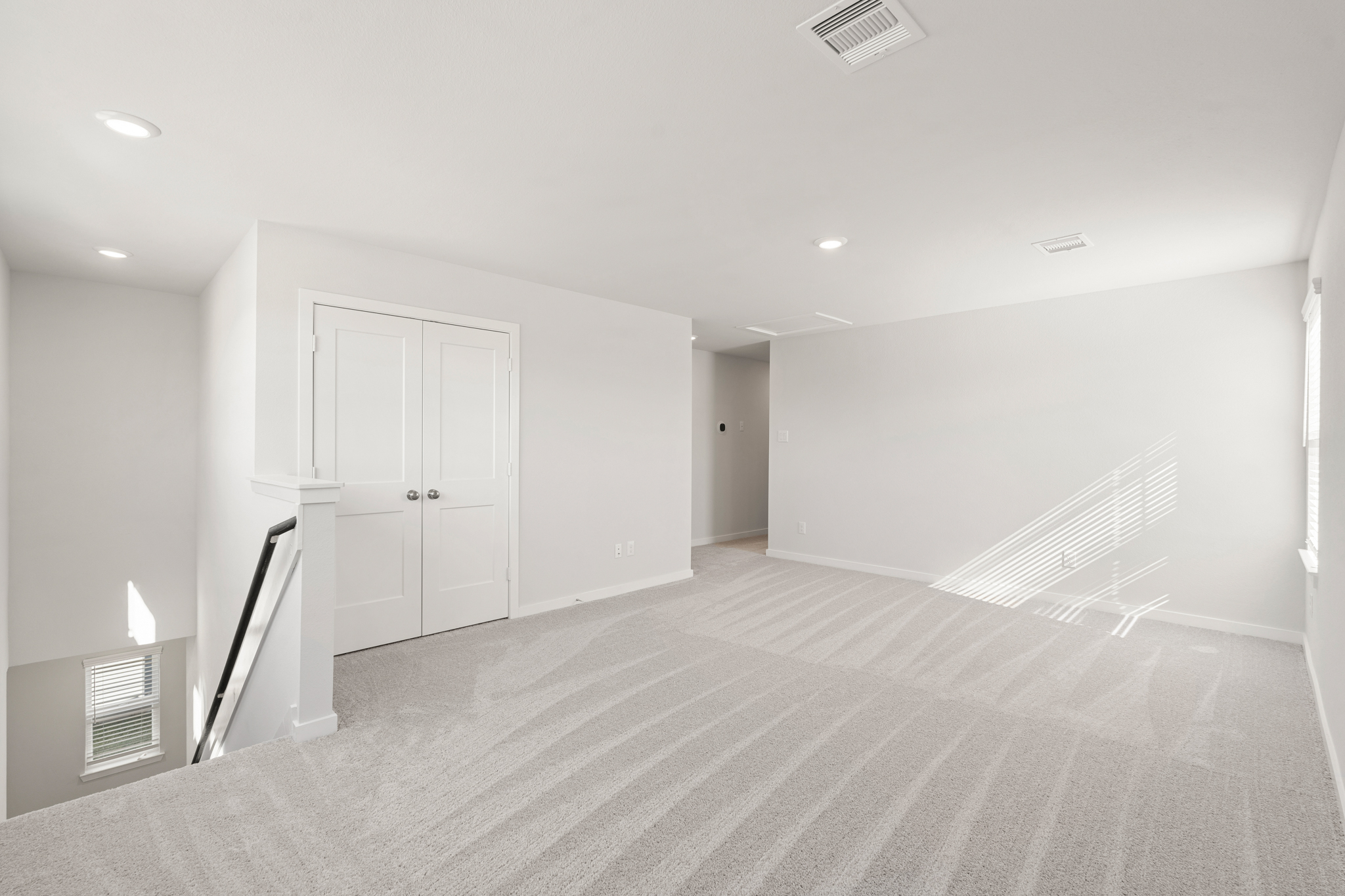 A room with white doors.