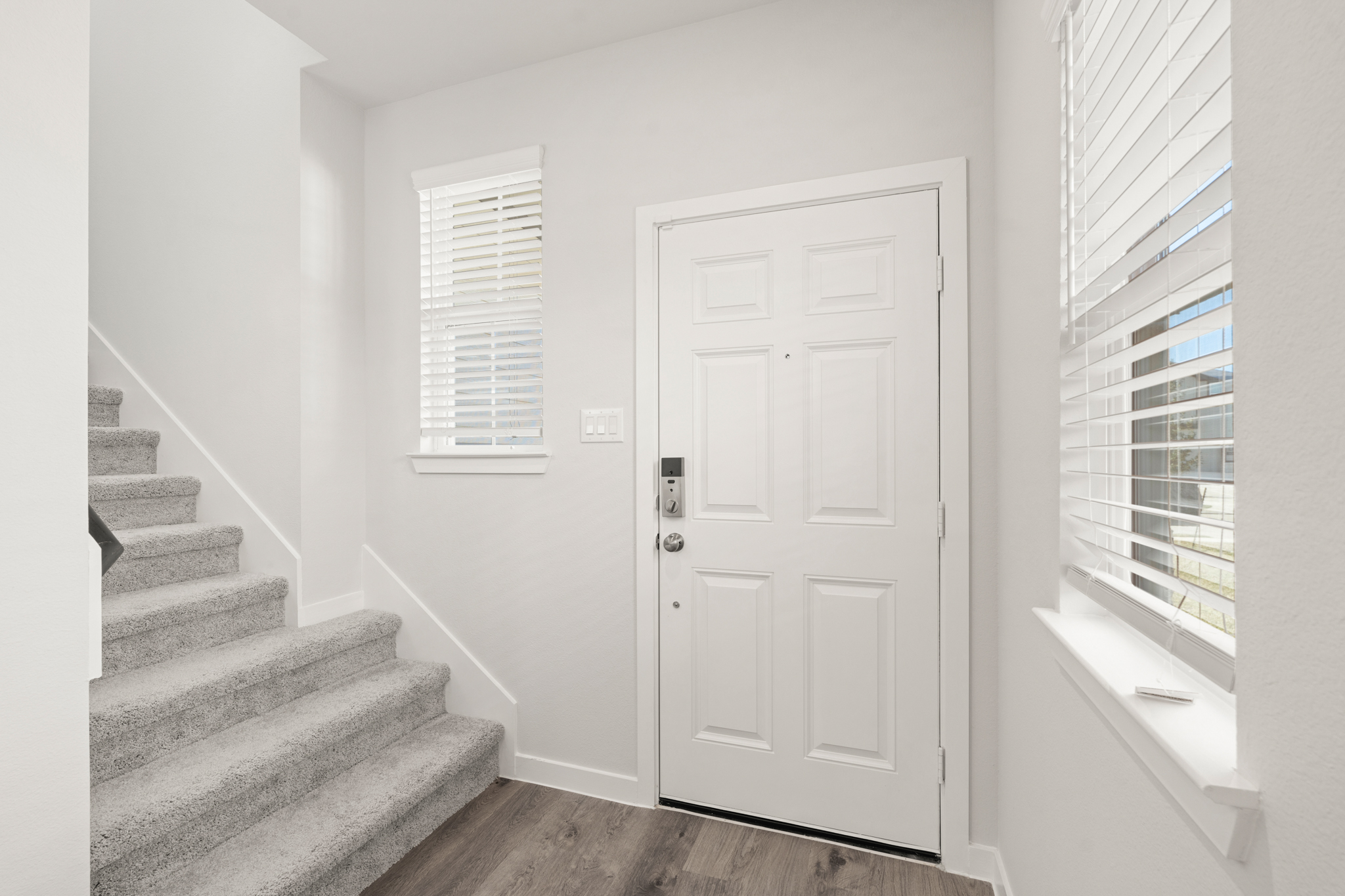 A white door in a room.