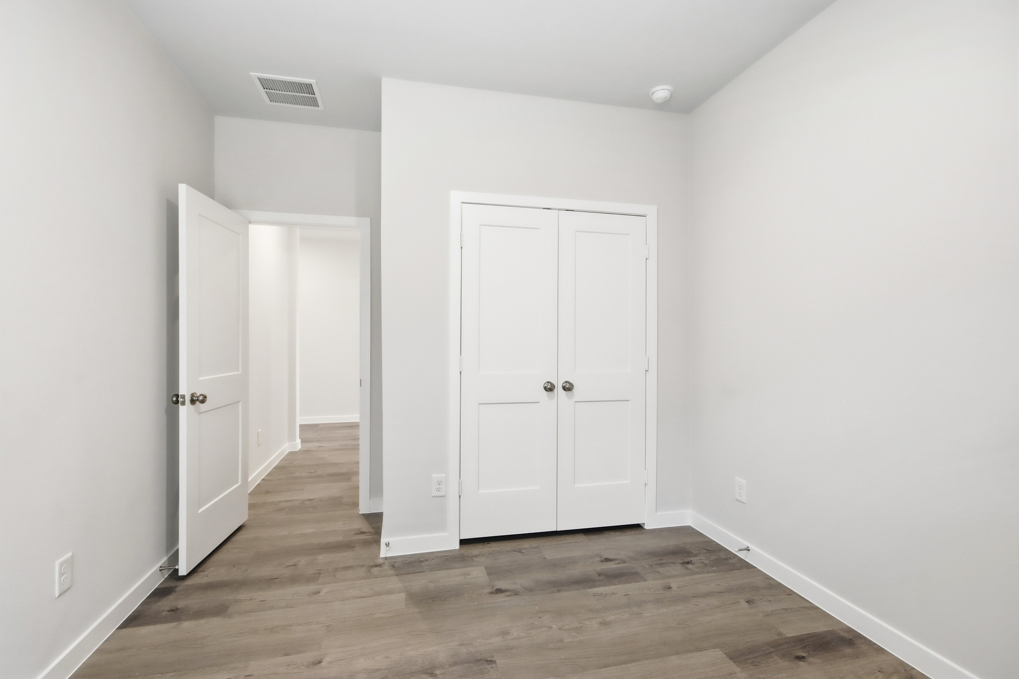 A room with white doors.