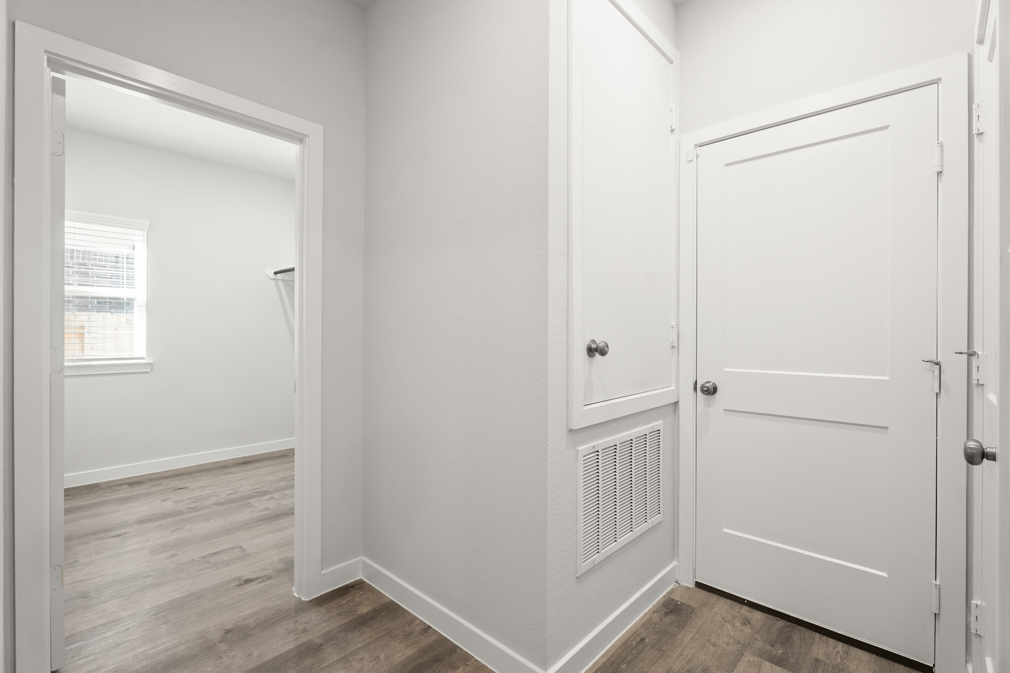 A white door in a room.