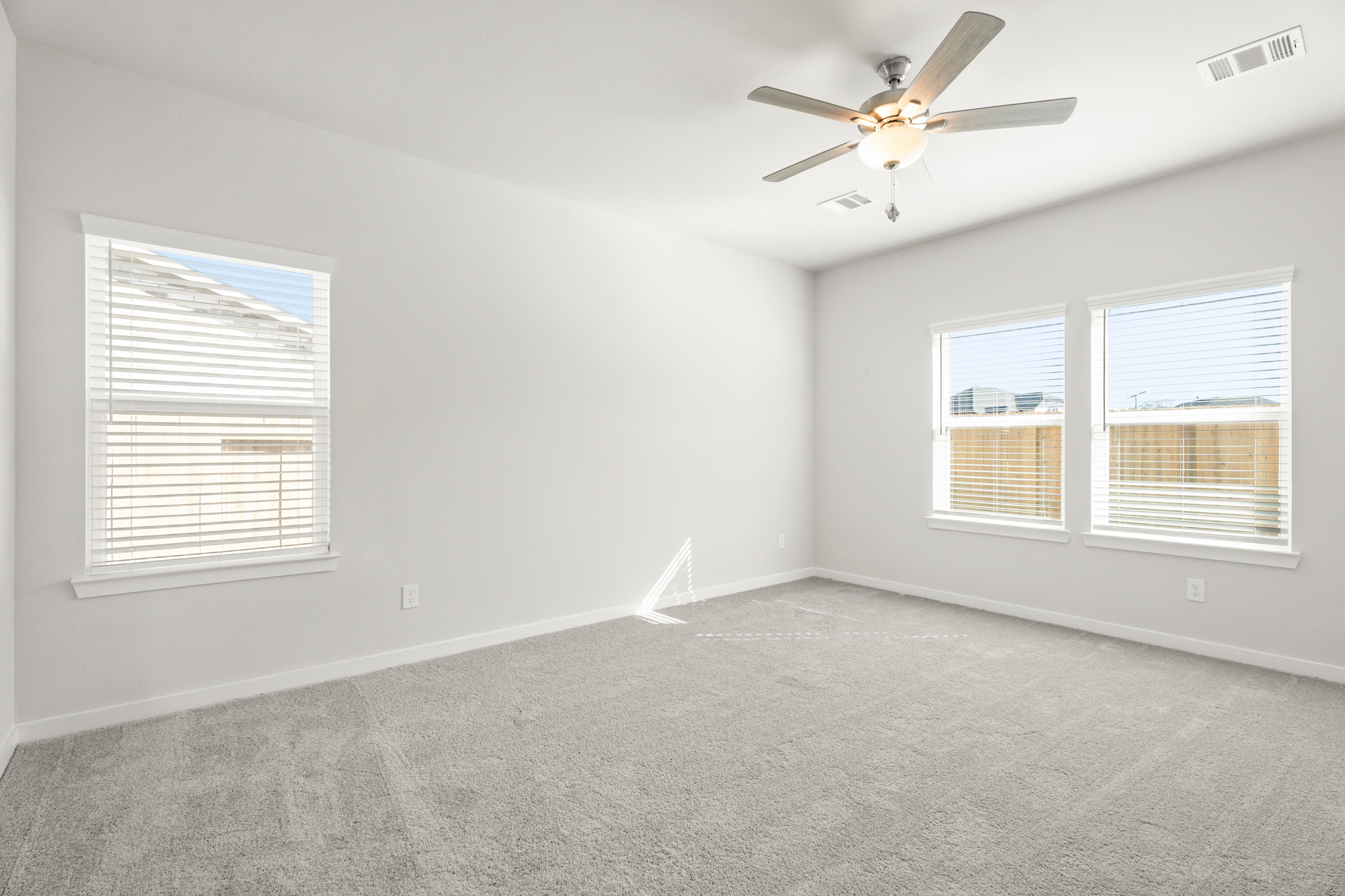 A ceiling fan in a room.