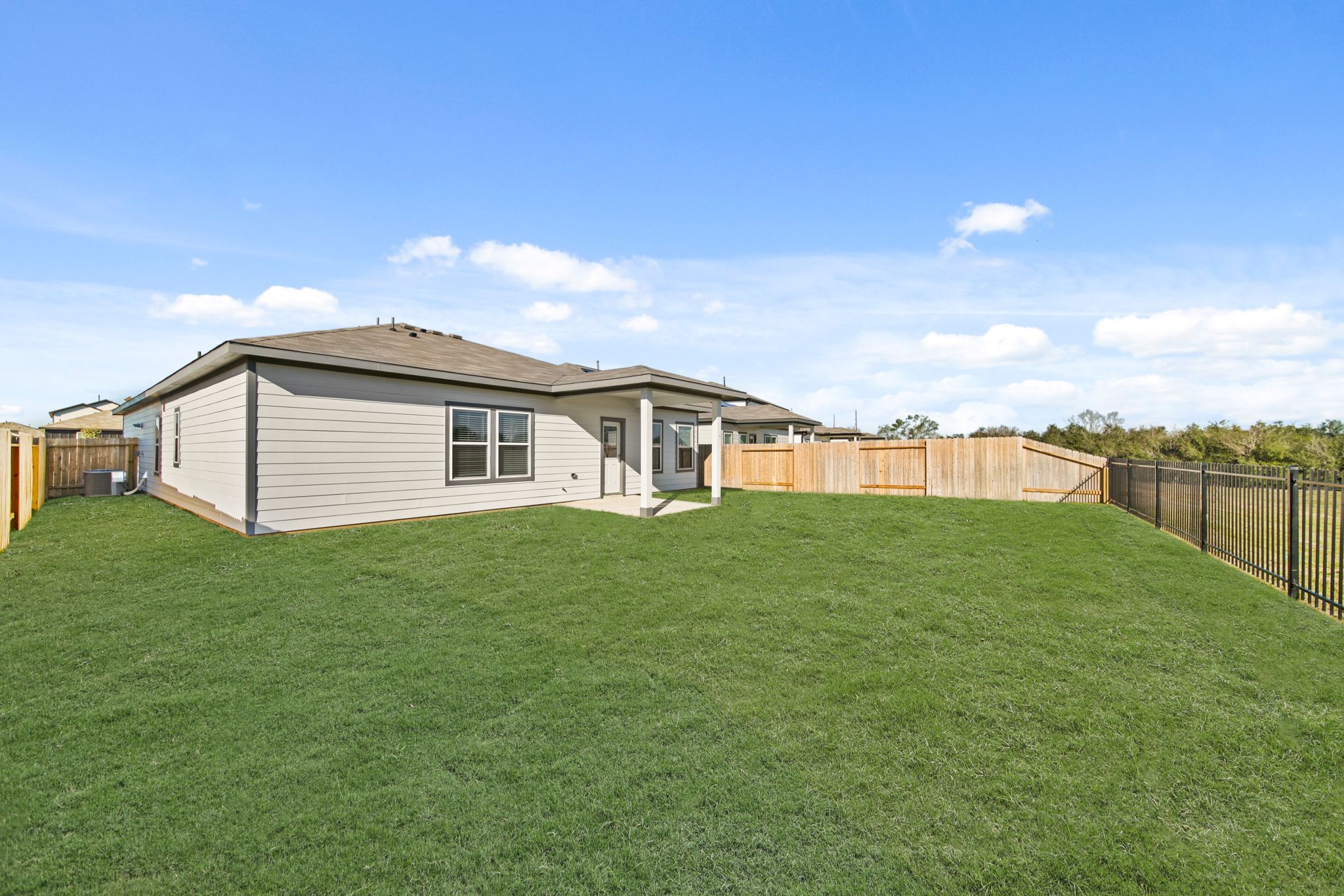 A house with a fence around it.