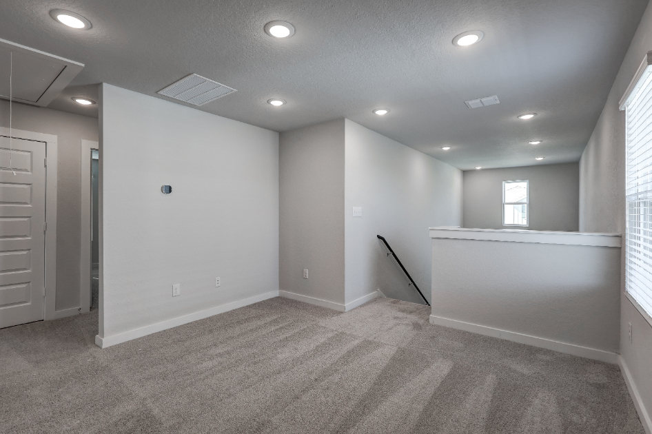 A room with white walls and a white counter top.