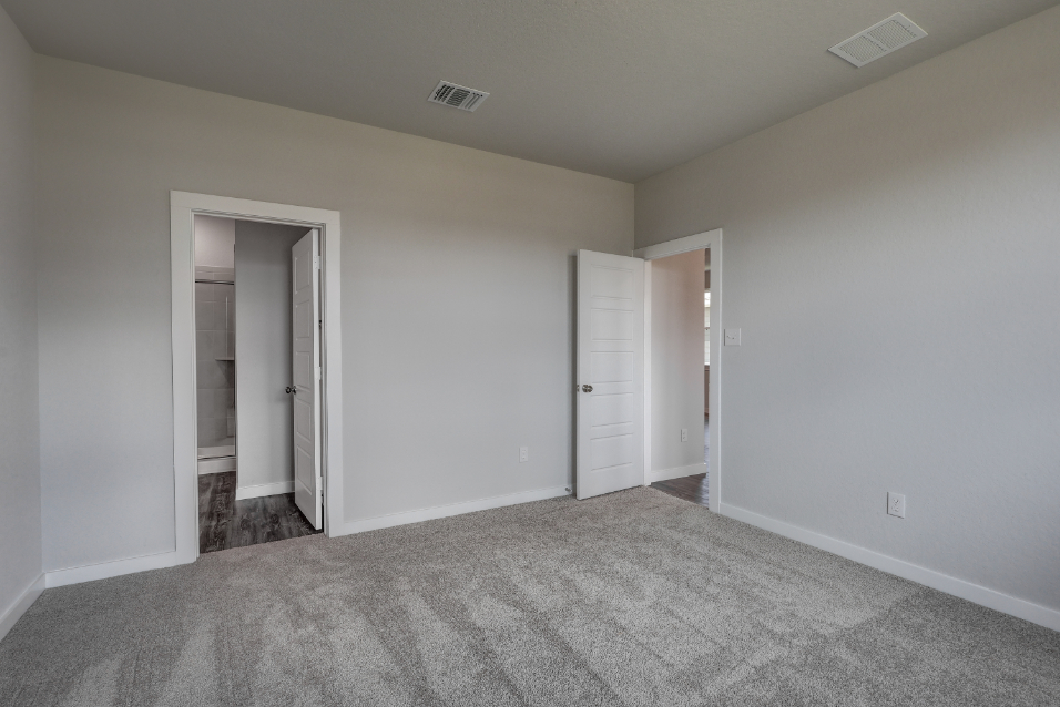 A room with white doors.