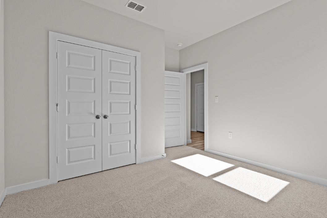 A room with white doors.
