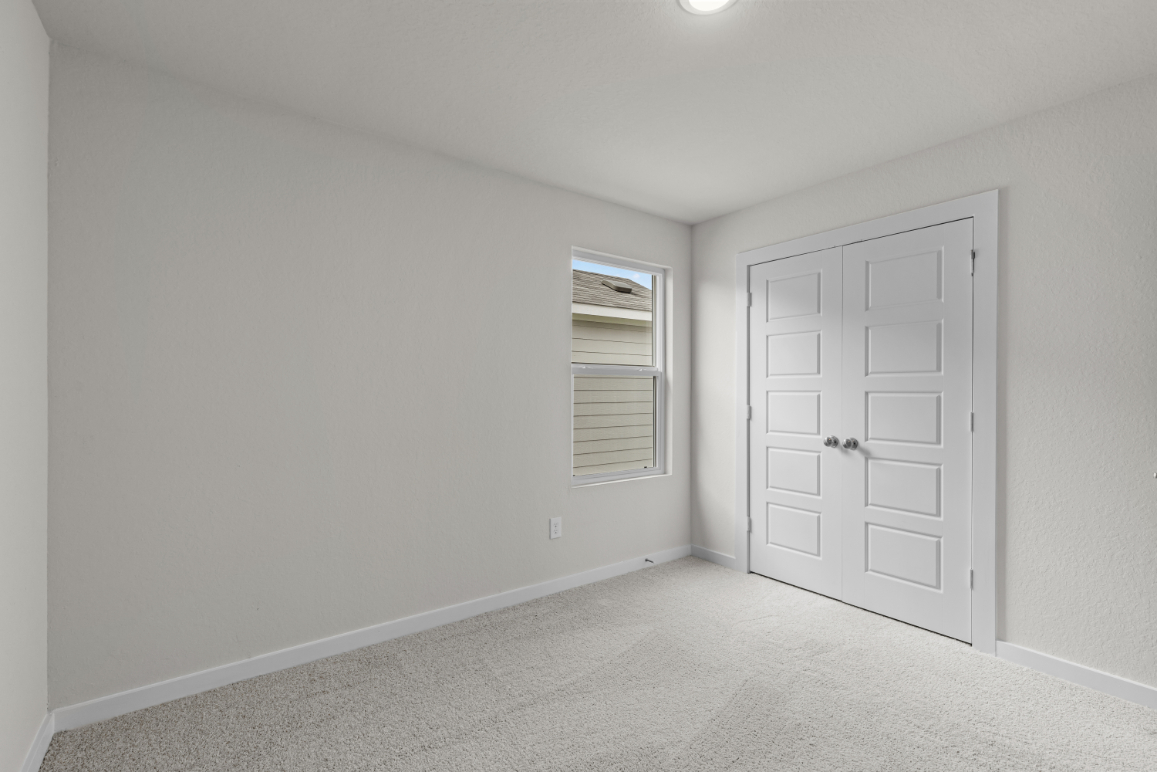 A room with white doors.