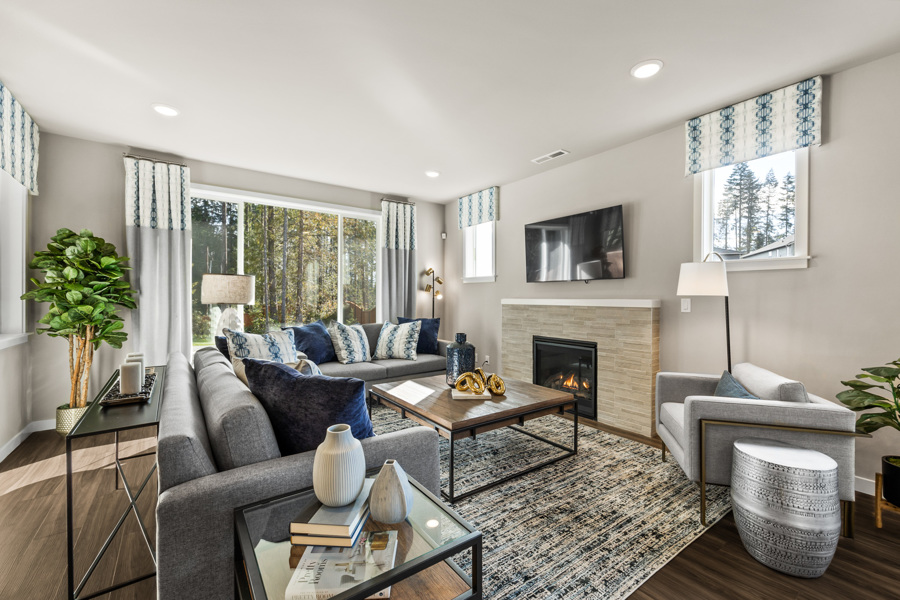 A living room with a fireplace.