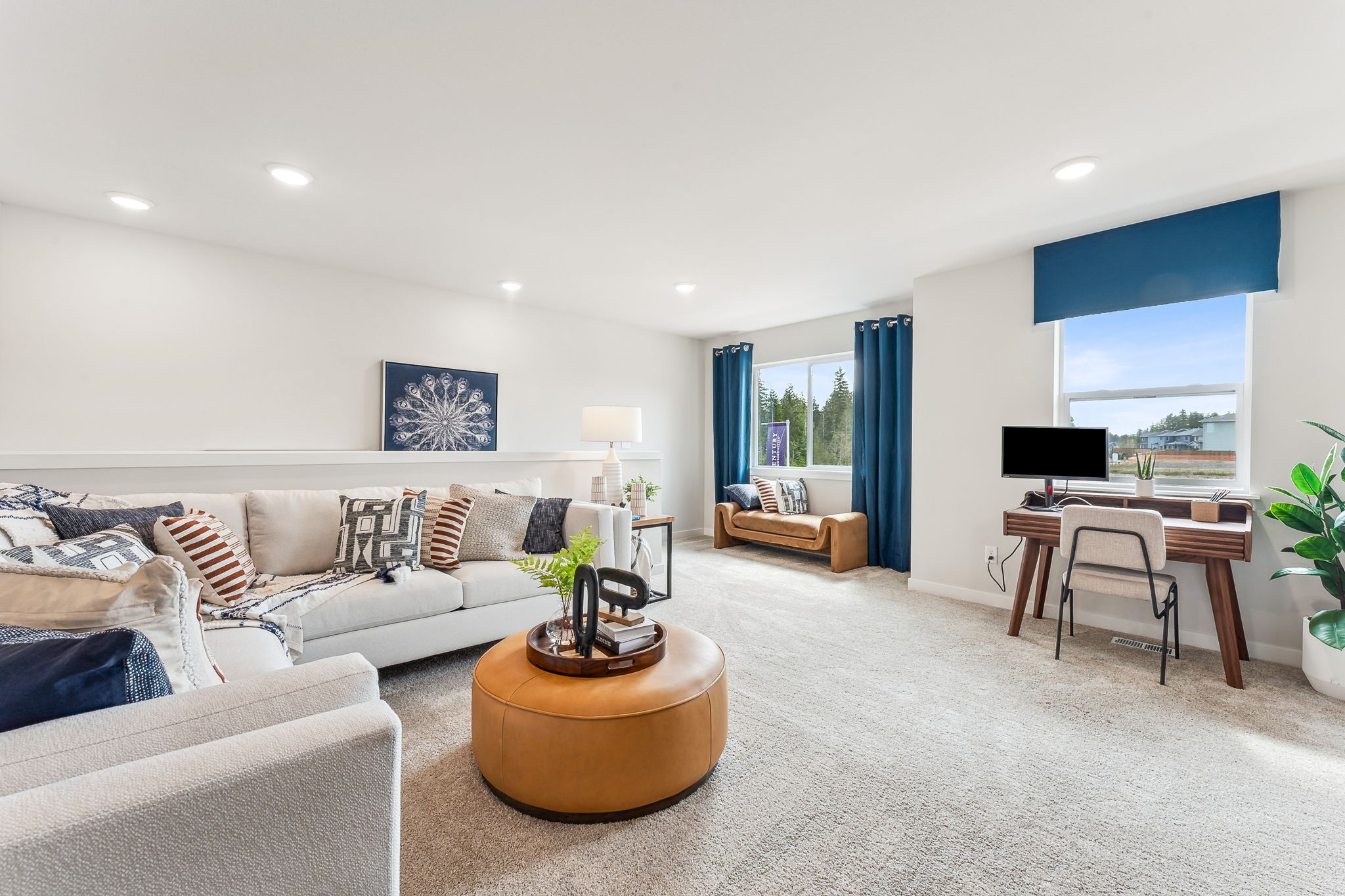 A living room with a large window.