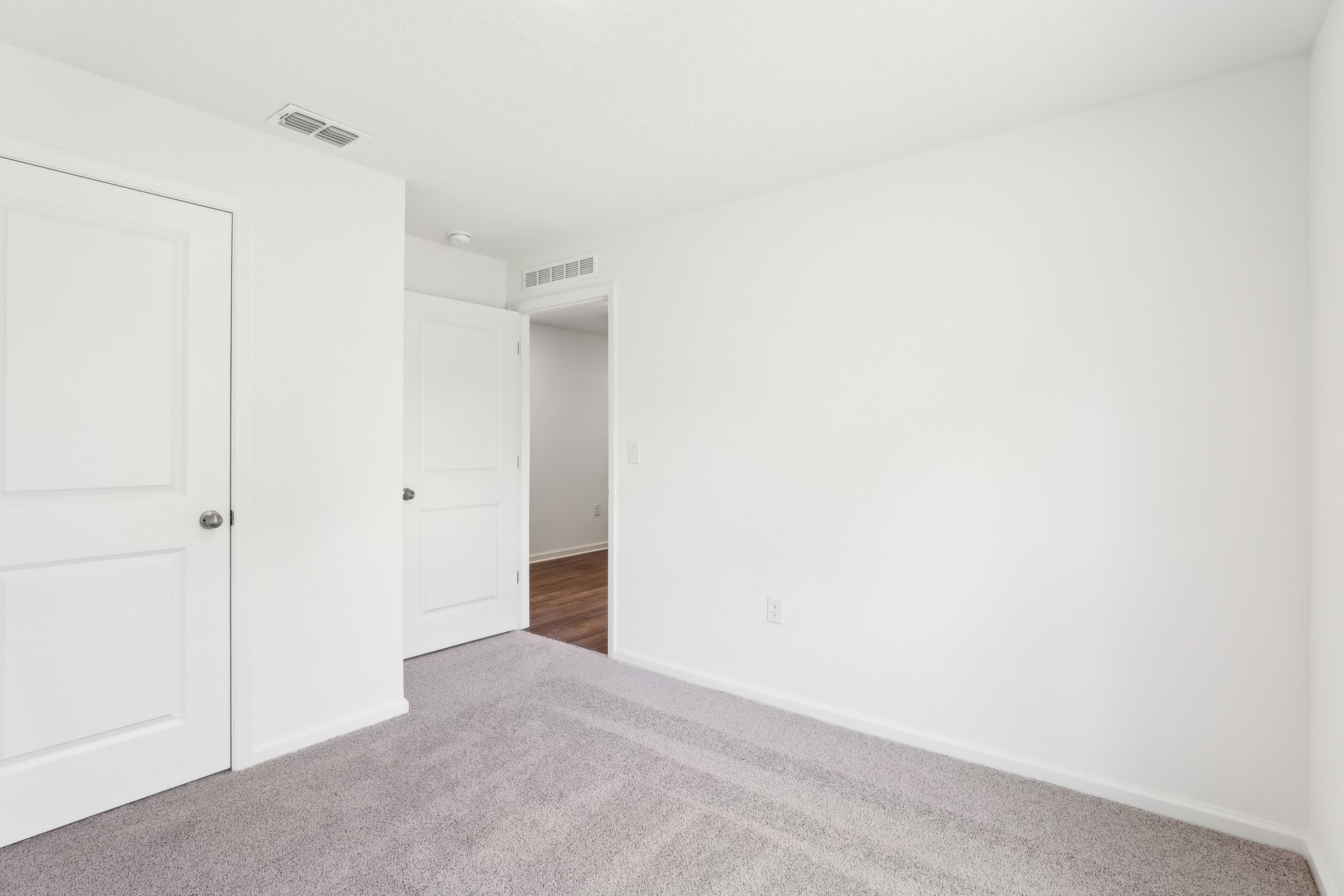 A room with white doors.