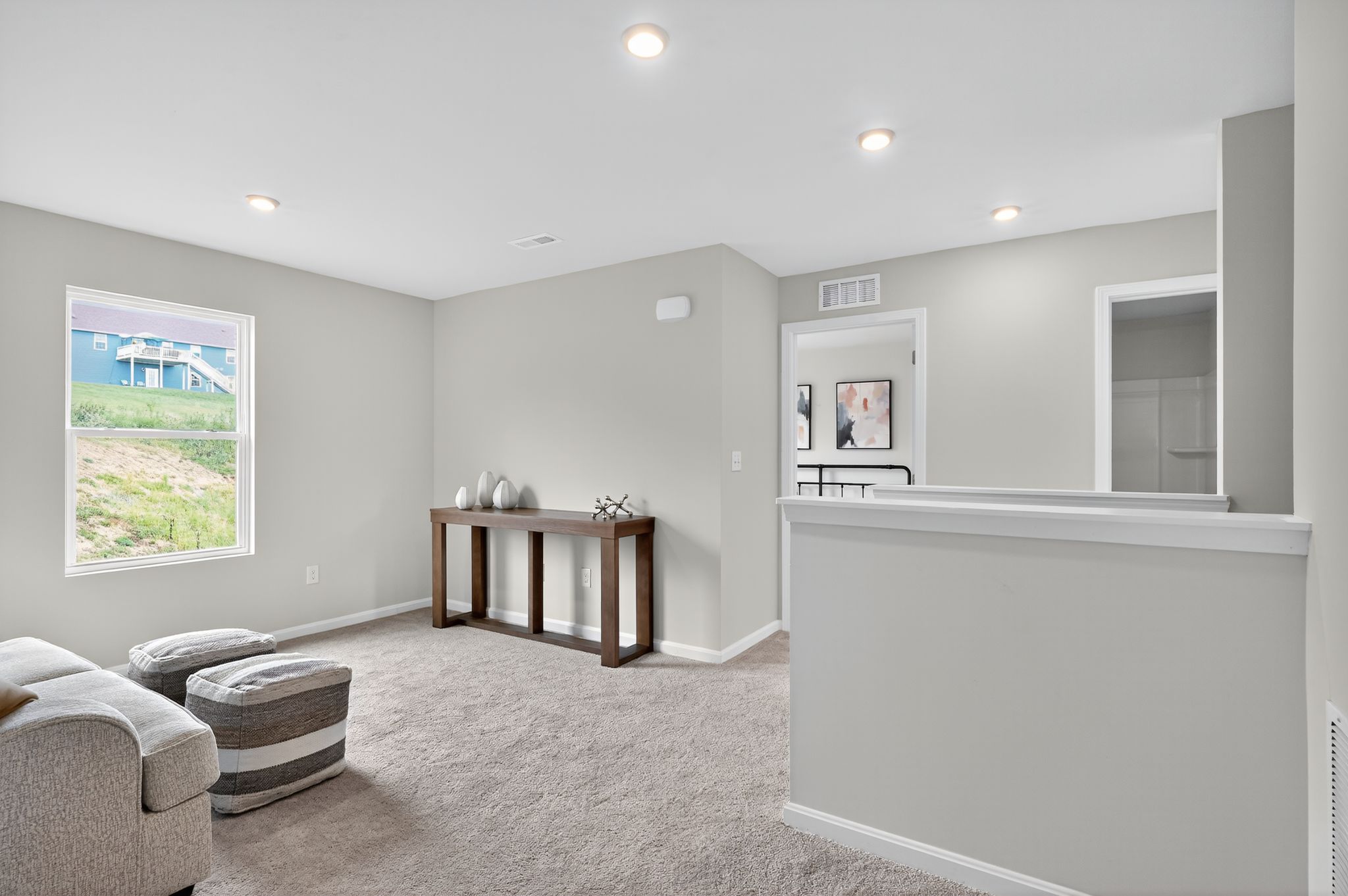 A room with a table and chairs.