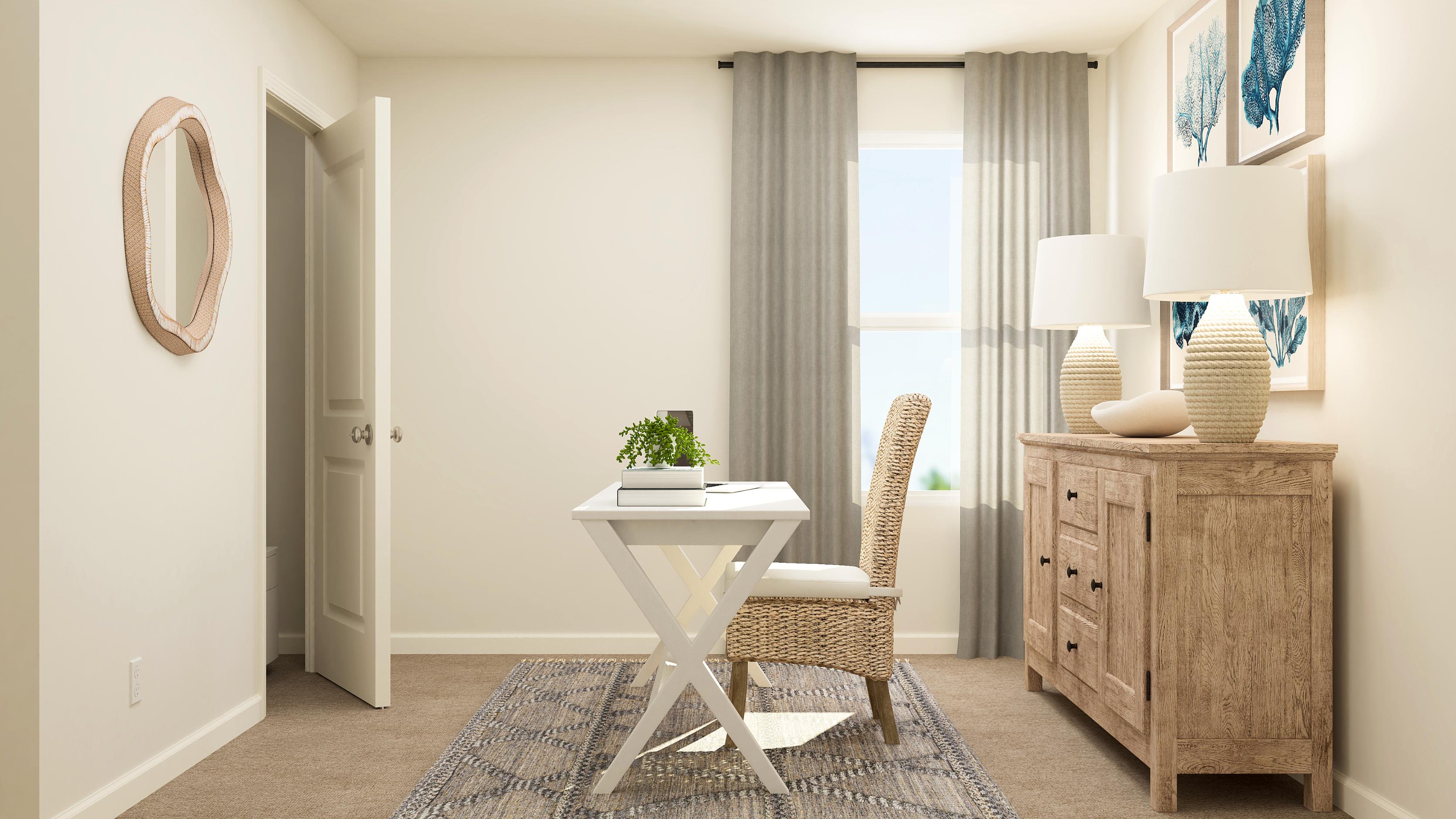 A room with a table and chairs.